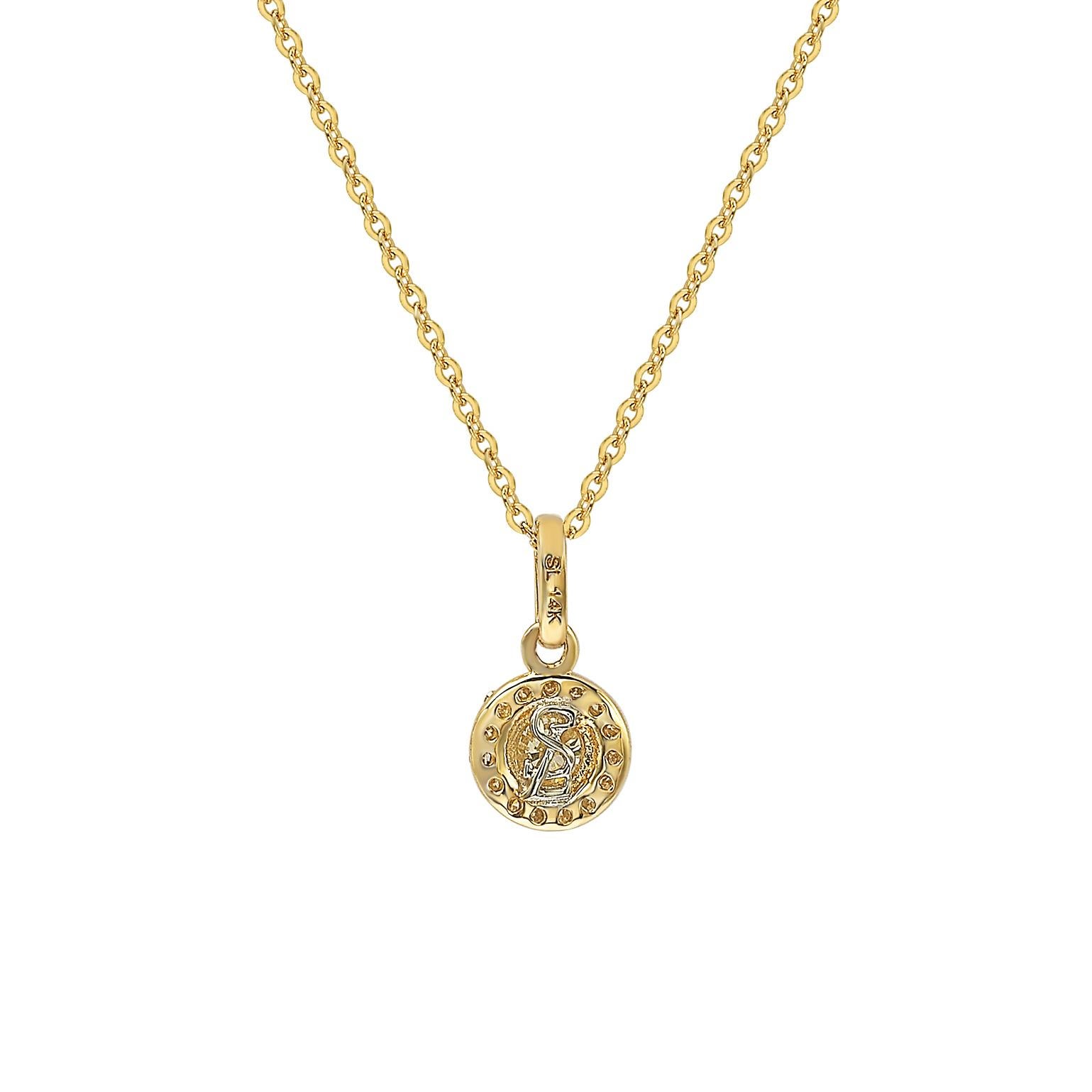Cet élégant pendentif auréolé de diamants Suzy Levian présente des diamants de taille ronde sur une monture en or jaune 14 carats. Ce magnifique pendentif contient 20 diamants blancs de taille ronde pour un total de 0,35 ctw. La pierre centrale,