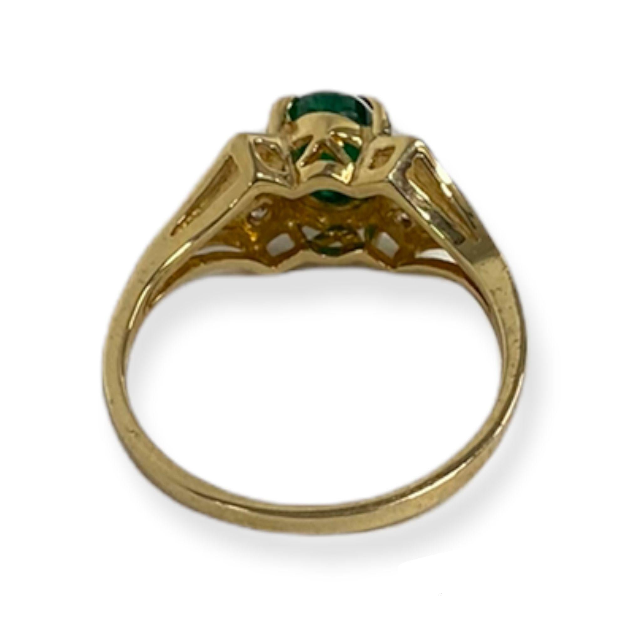 This spectacular ring from the Suzy Levian collection features 14k gold. An array of white diamonds (.20cttw) accent the perfect green color of the emerald gemstone center stone (.75ct) . The brilliance of these gems and the luster of the