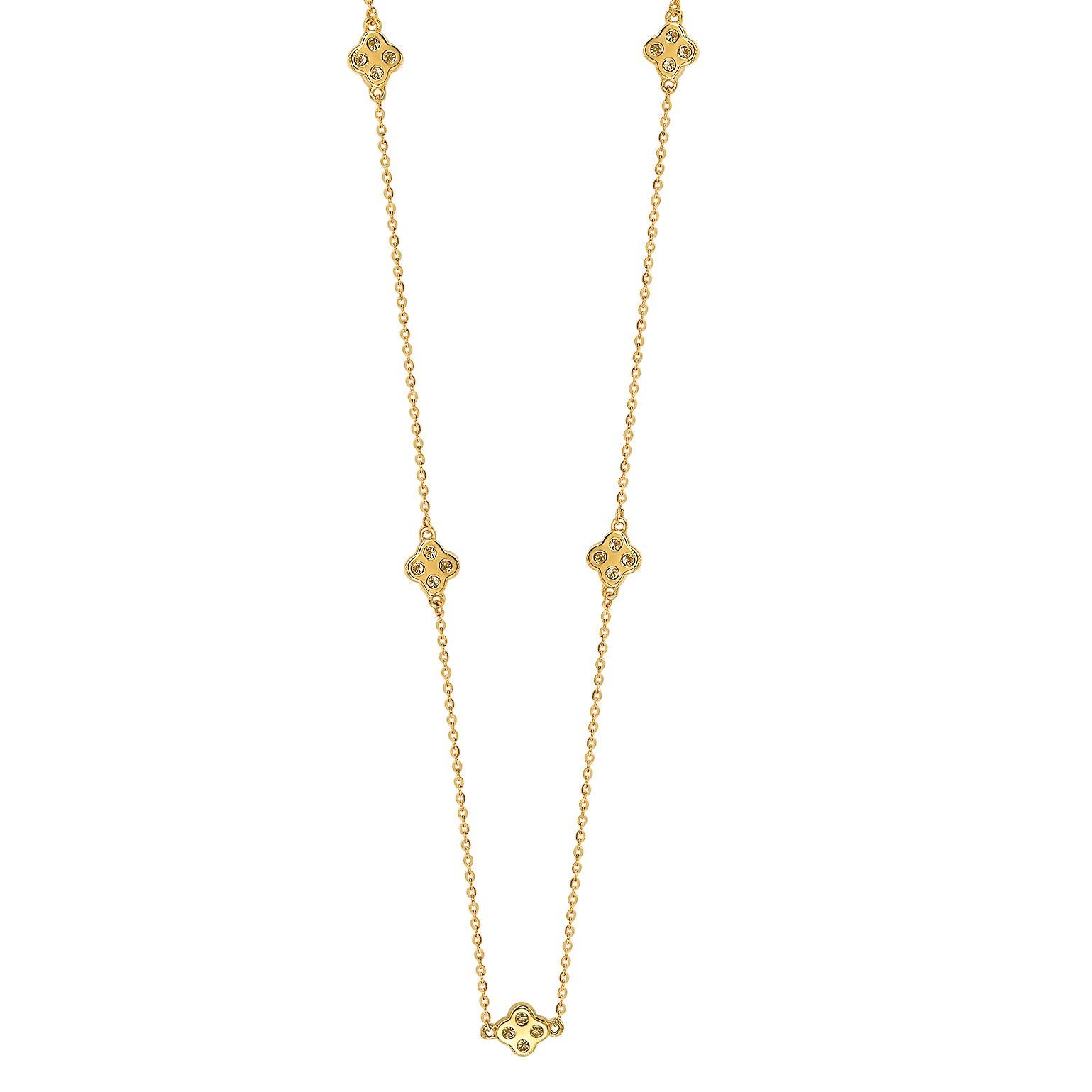This unique Suzy Levian diamond clover by the yard necklace displays round-cut diamonds on 14 karat yellow gold setting. This gorgeous necklace contains 20, 1.75 mm white round cut diamonds totaling .40 cttw. The necklace has 7 clovers, each clover