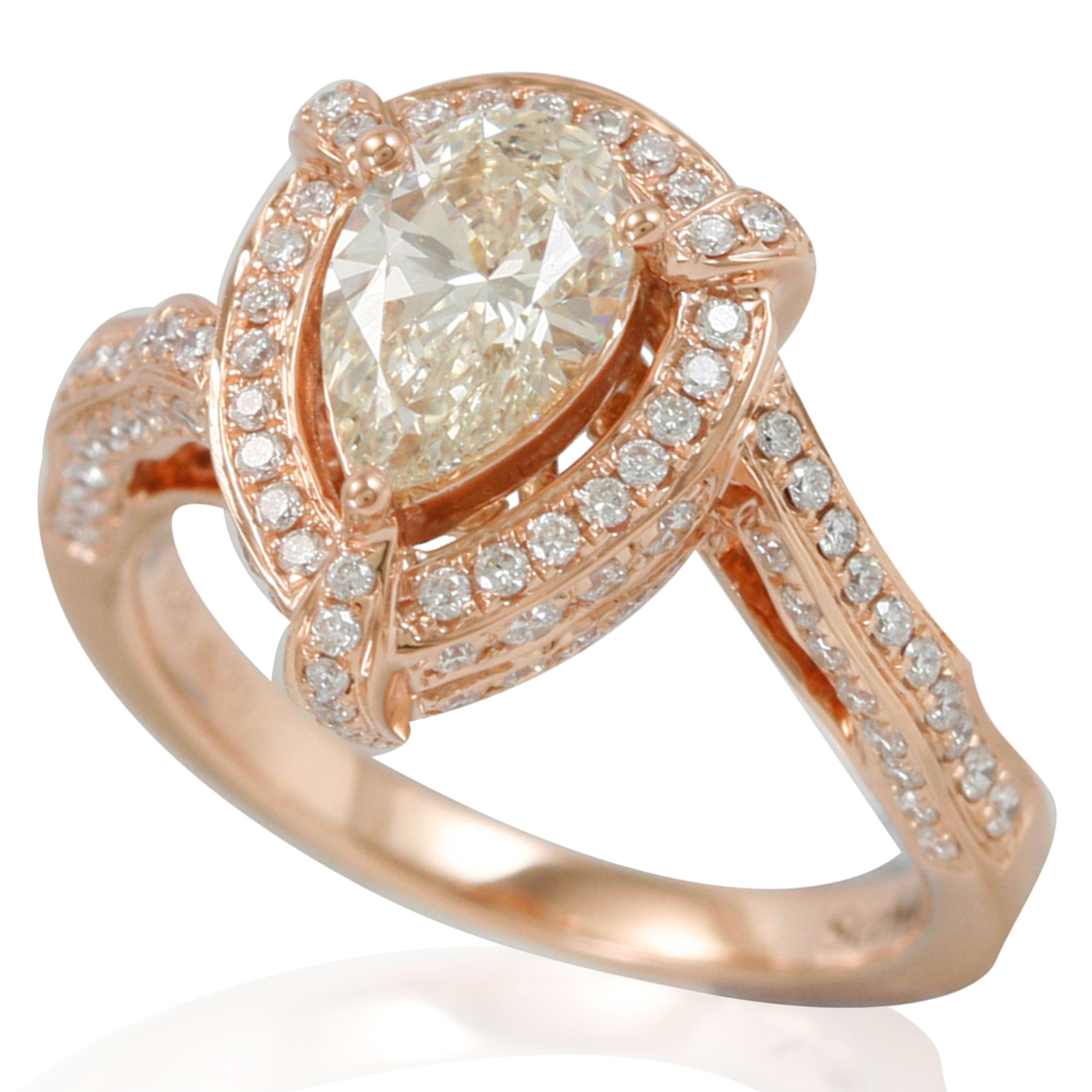 This gorgeous Suzy Levian 18-karat rose gold ring features a pear-shaped natural yellow diamond center stone. The setting is accented with 124 round-cut white diamonds set in highly polished rose gold.

Yellow diamond
Diamonds: One
Diamond cut: