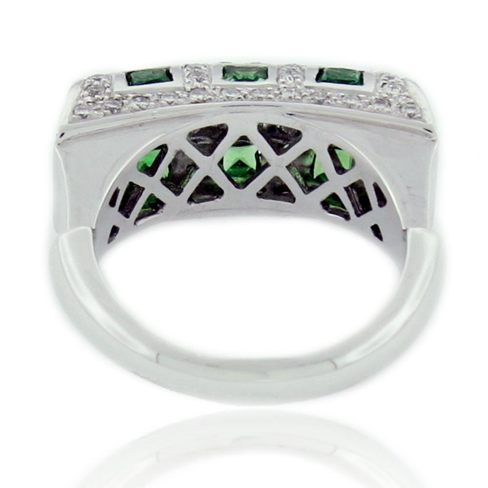 This stunning, unique ring from the Suzy Levian Limited Edition collection features 18k white gold. An array of white diamonds (.89cttw) accent 8 perfect asscher-cut, green tsavorite baguette gemstones (1.10ct). The brilliance of these stones and