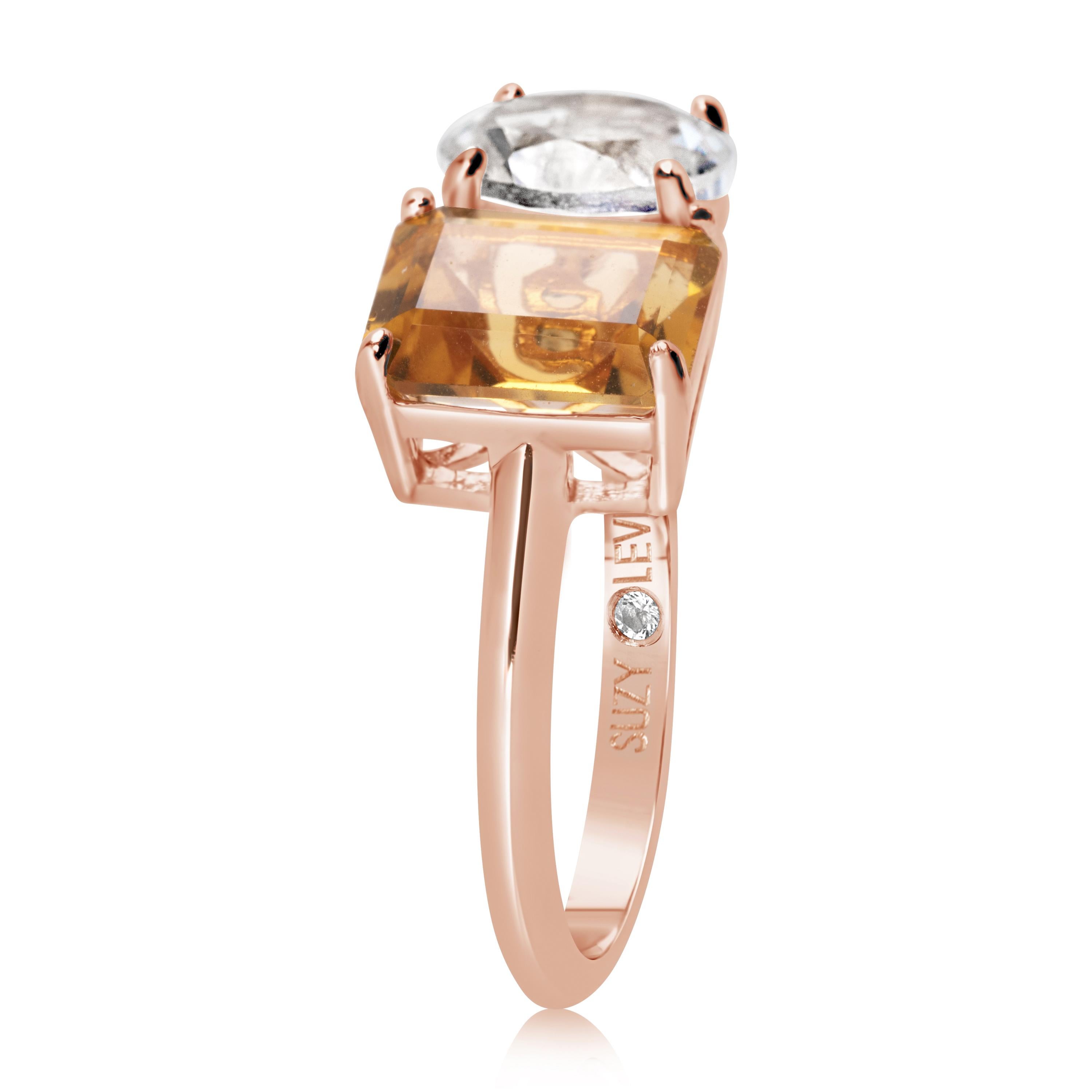 Shimmering in hues of white and orange, this Suzy Levian ring is as on trend as can be, and features a round cut white topaz and an emerald cut orange citrine as a perfectly matched pair. This ring symbolizes a perfect pairing of unique shapes. This