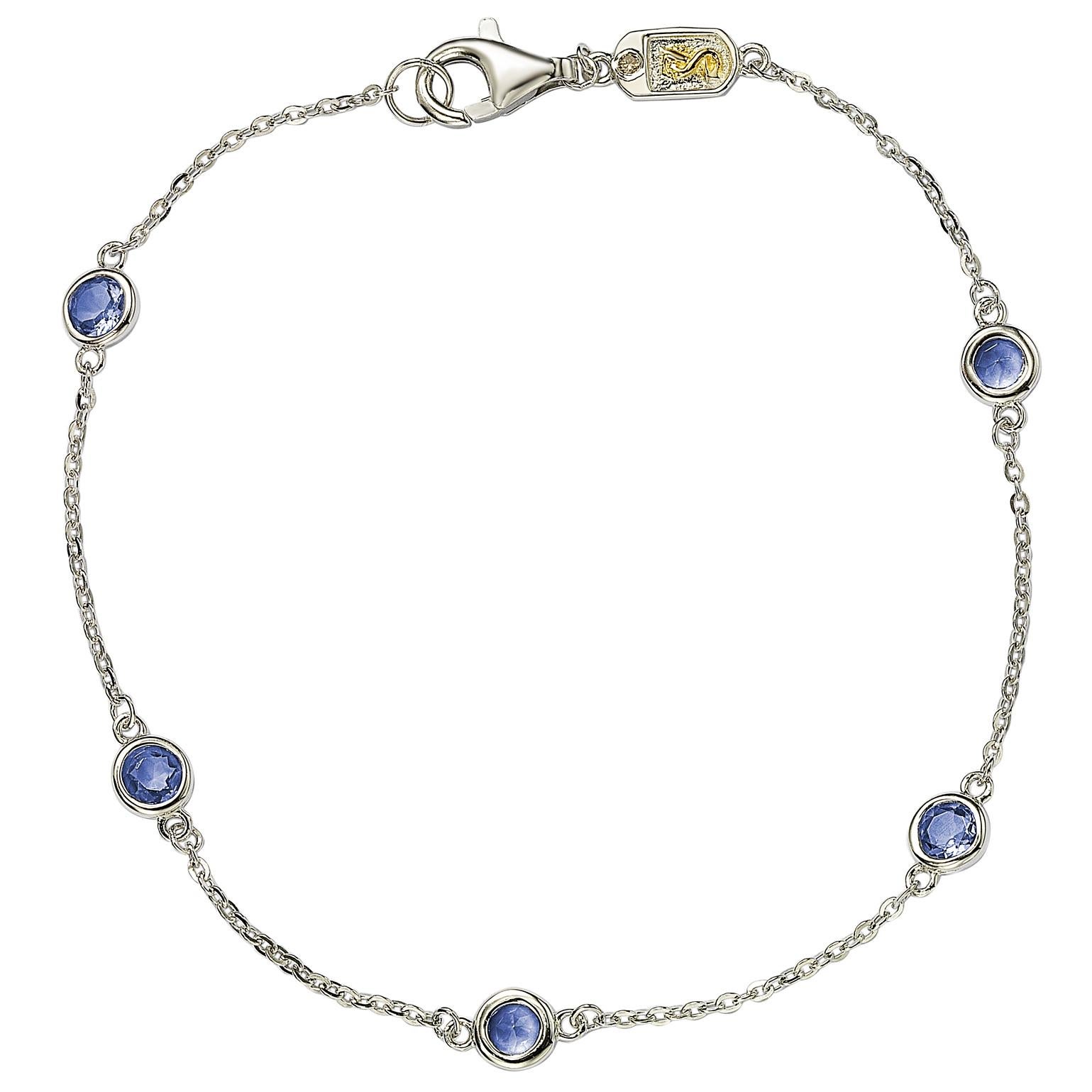 Adorn your hand with sparkling shimmers with this beautiful sapphire station bracelet. This bracelet can be worn stackable with other bracelets or as a single bracelet, making it the perfect bracelet for every occasion. This bracelet features five