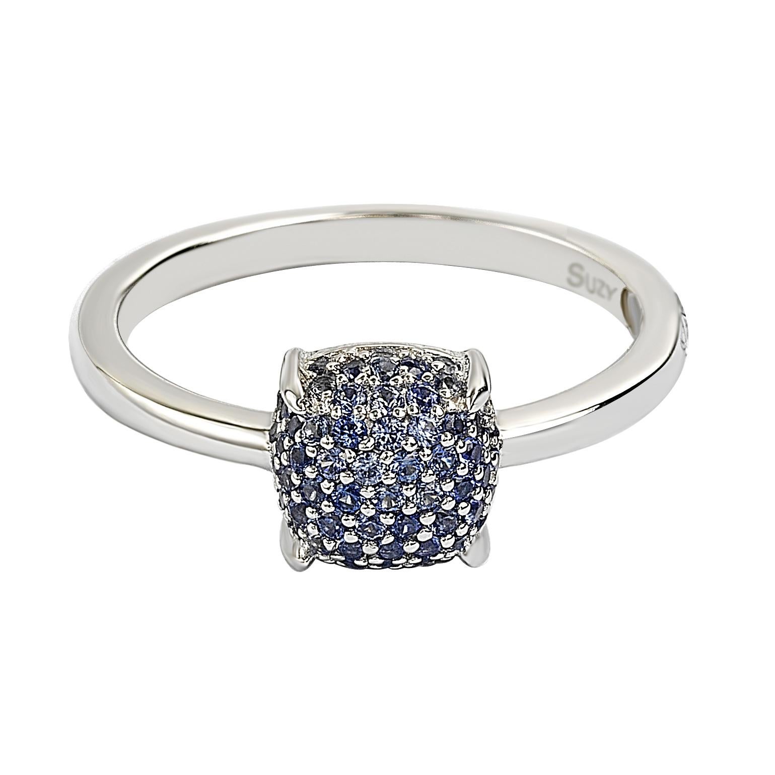 Enjoy beachy blues all year long with sapphire hues. A cluster of pave natural blue sapphires create a ball-top design, set in a sterling silver band. This beautiful ring is from Suzy Levians latest collection, 