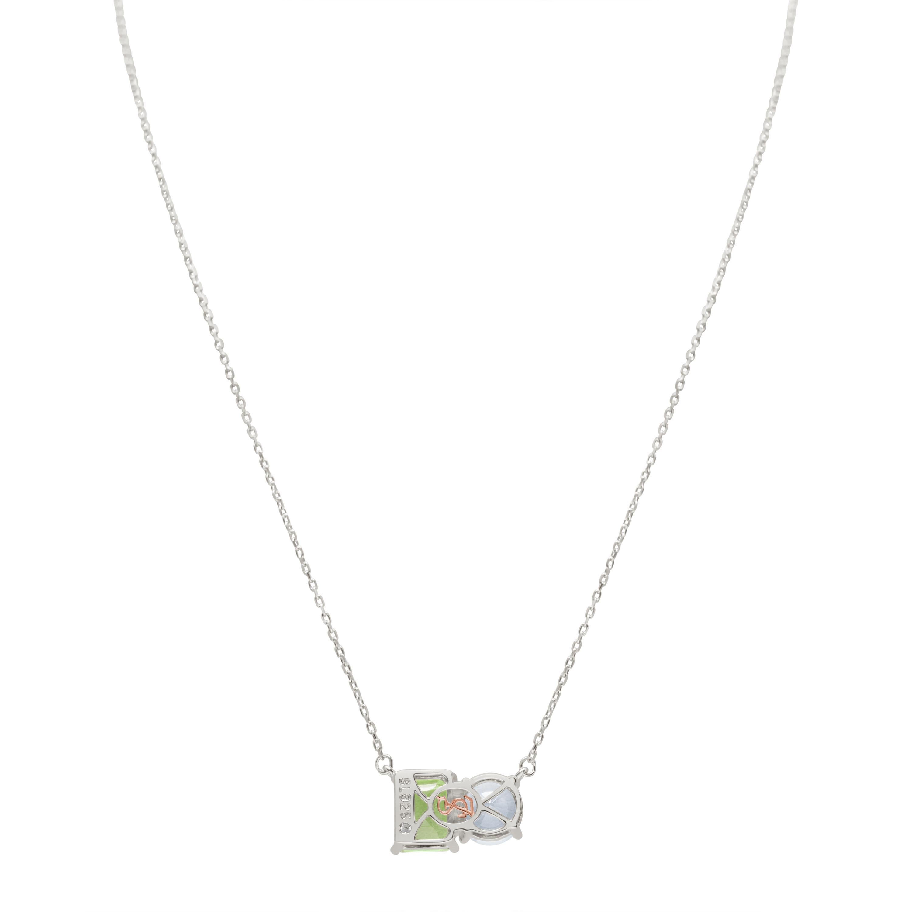 Shimmering in hues of white and green, this Suzy Levian Toi Et Moi necklace is as on trend as can be, and features a round cut white topaz and an emerald cut green amethyst as a perfectly matched pair. French for 