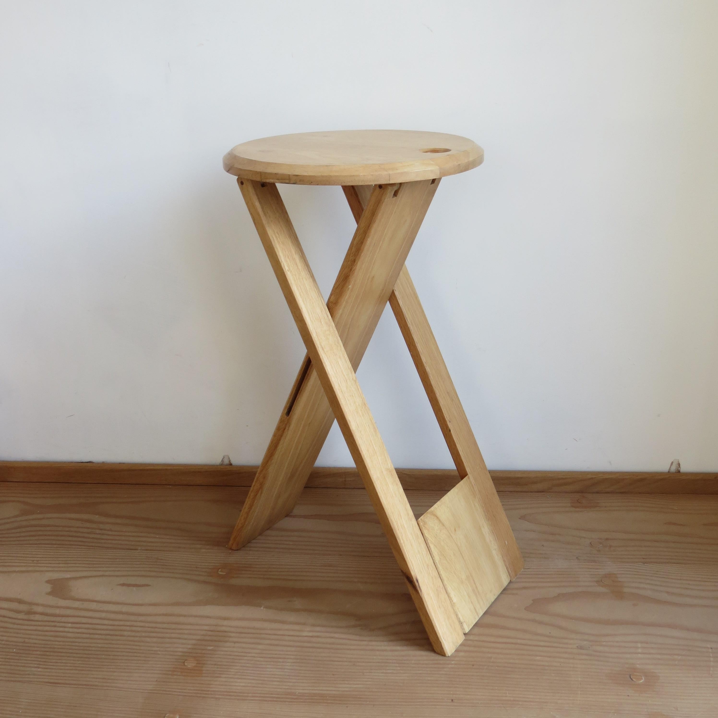 A folding Suzy stool, designed by Adrian Reed and produced by Princes Design Works in 1984-1985.
Made from solid Deal, the stools fold and can be hung up for ease of storage.
Good vintage condition, general signs of use.



 