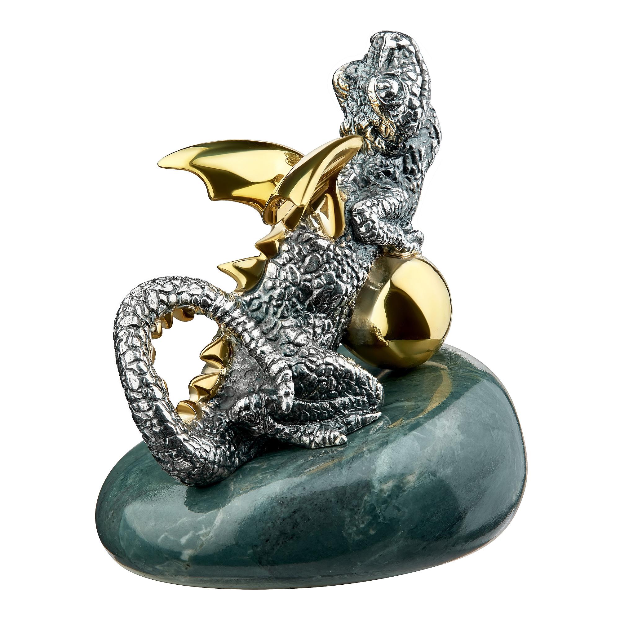 MOISEIKIN's exquisite miniature of Dragon Sculpture – a fusion of artistry, symbolism, and functionality. Crafted and engraved from silver and adorned with gilded carvings, this majestic Winged Dragon captures the essence of wealth and power, making