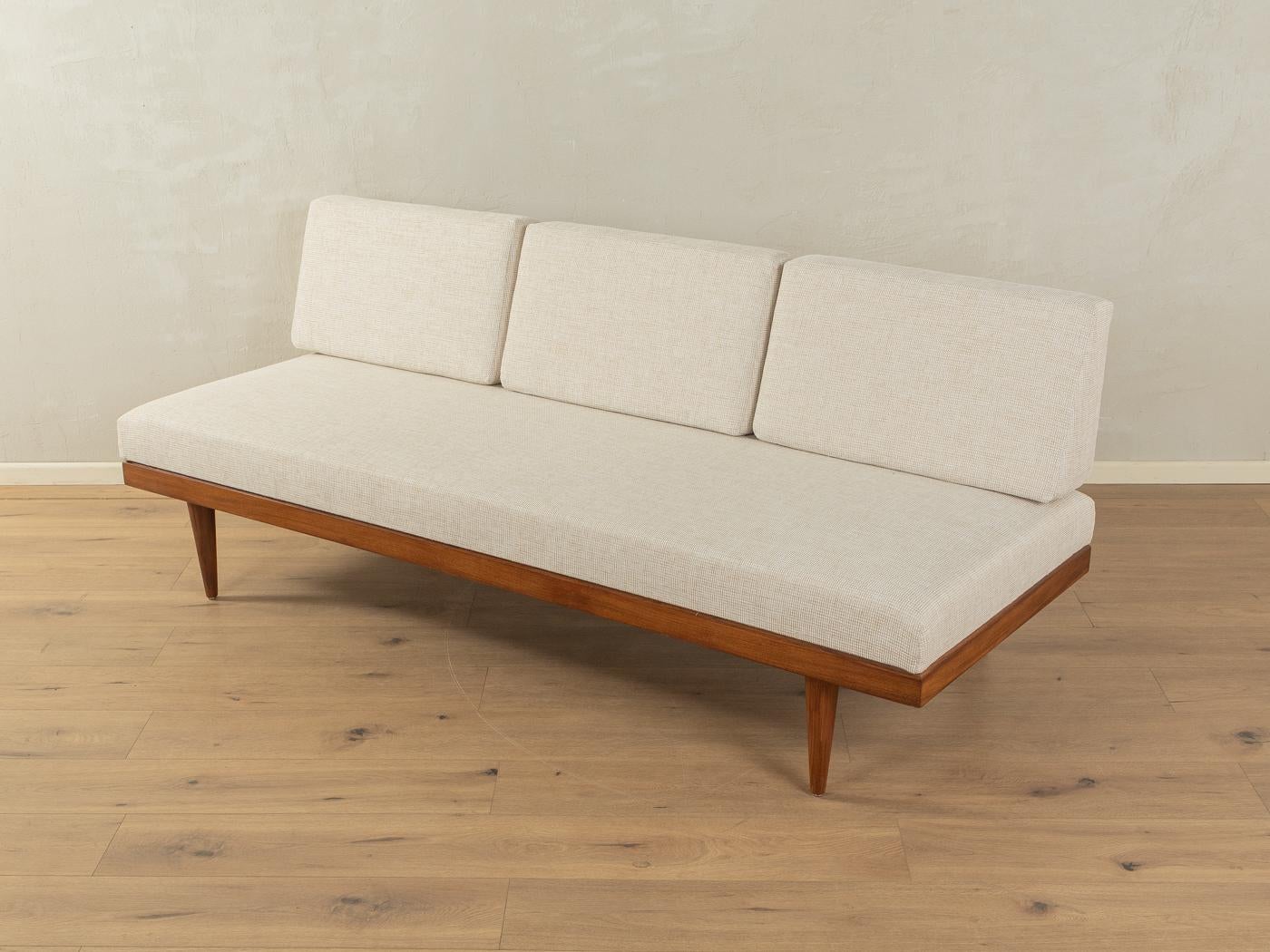 Wonderful 1960s SVANE sofa by Ingmar Relling for Ekornes with a solid teak frame and a practical bed box . The sofa has been reupholstered, covered with a high-quality fabric in beige and can be used as a daybed as well.

Quality Features:

   