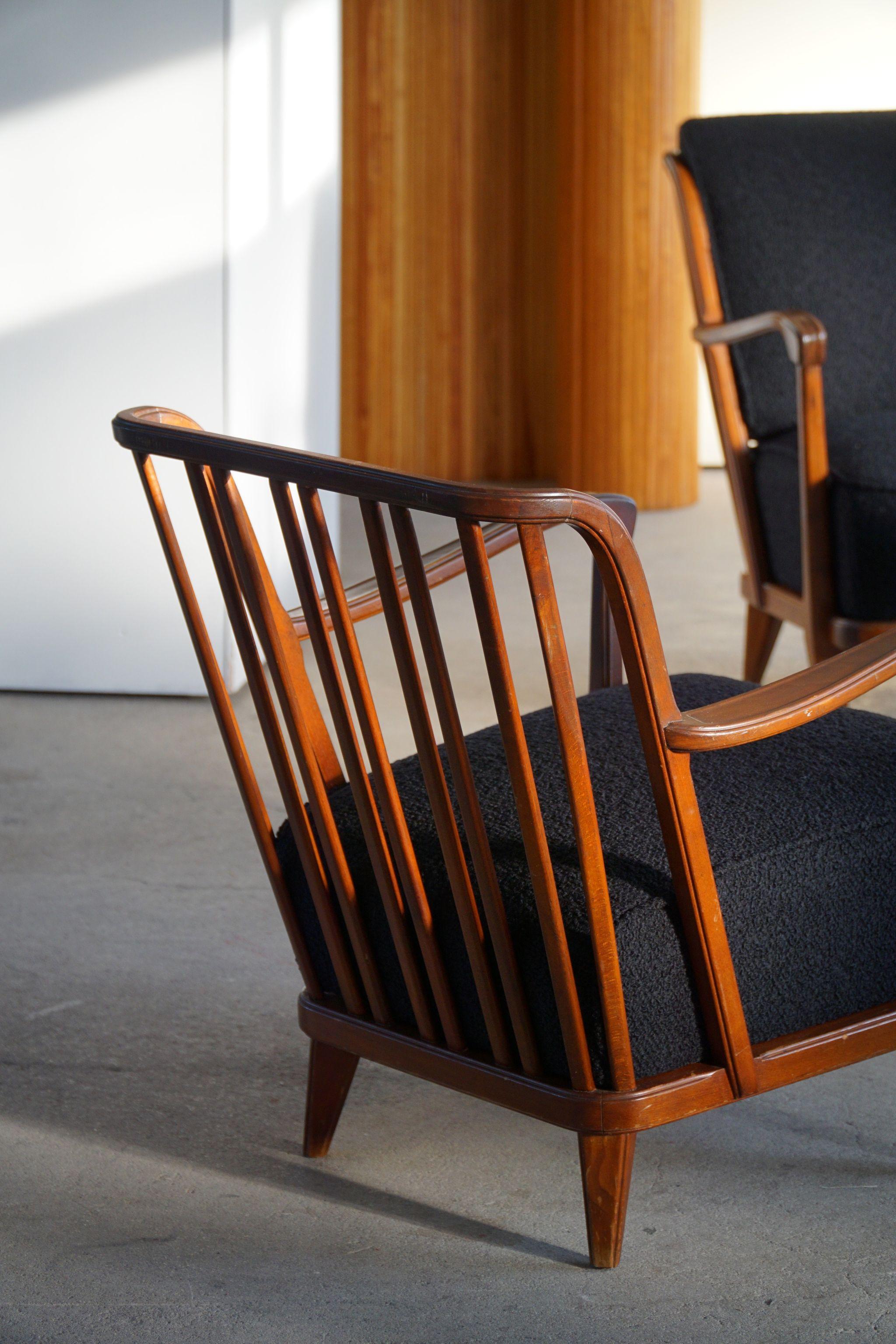 A modern pair of lounge chairs, designed by Svante Skogh made at 