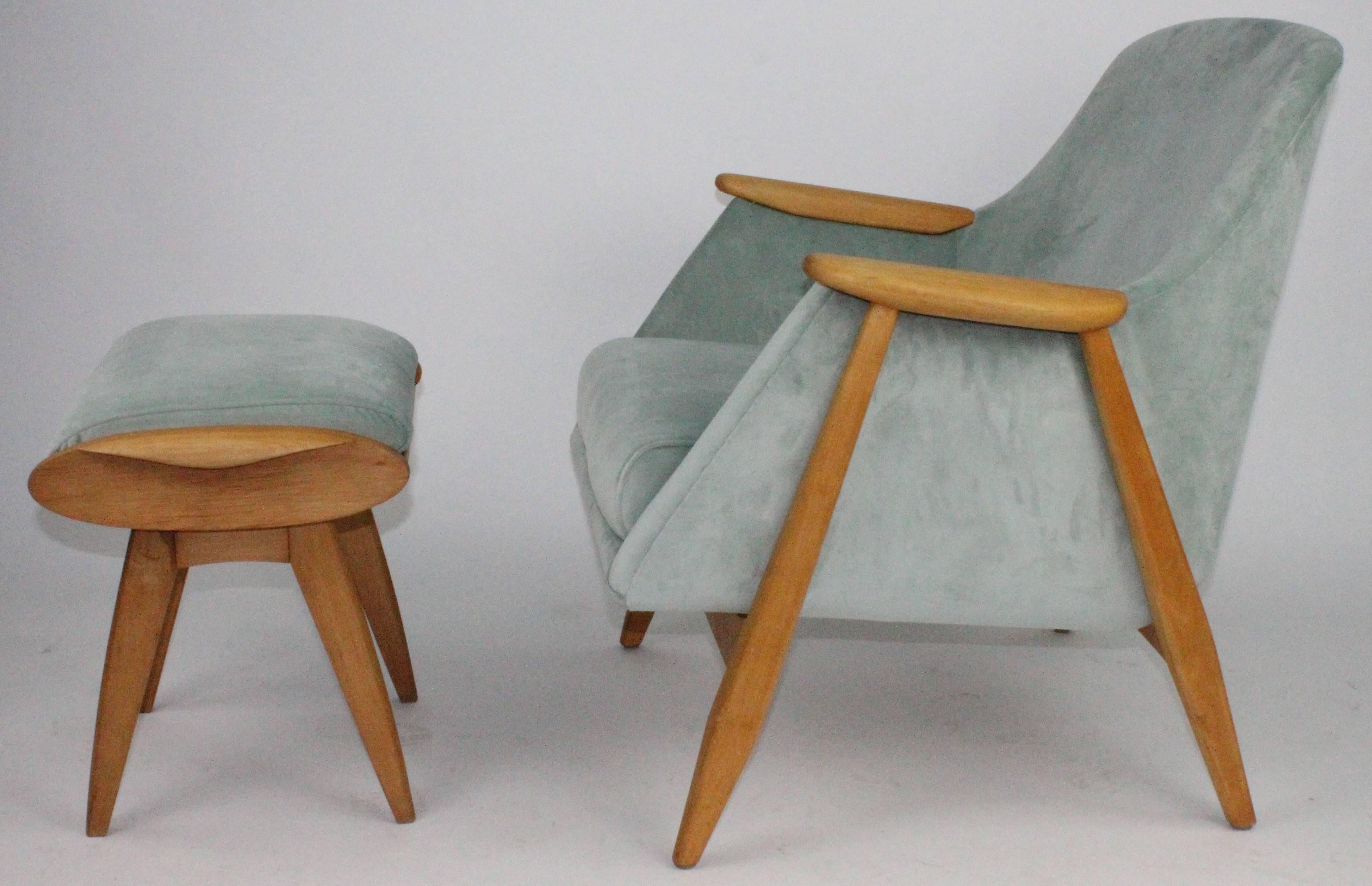 A wonderful set of an easy chair with stool. By Swedish designer Svante Skogh for Finnish maker Asko. This is model no 2418. Recently restored and newly upholstered in a light green velvet of high quality. This set was designed by Svante Skogh in