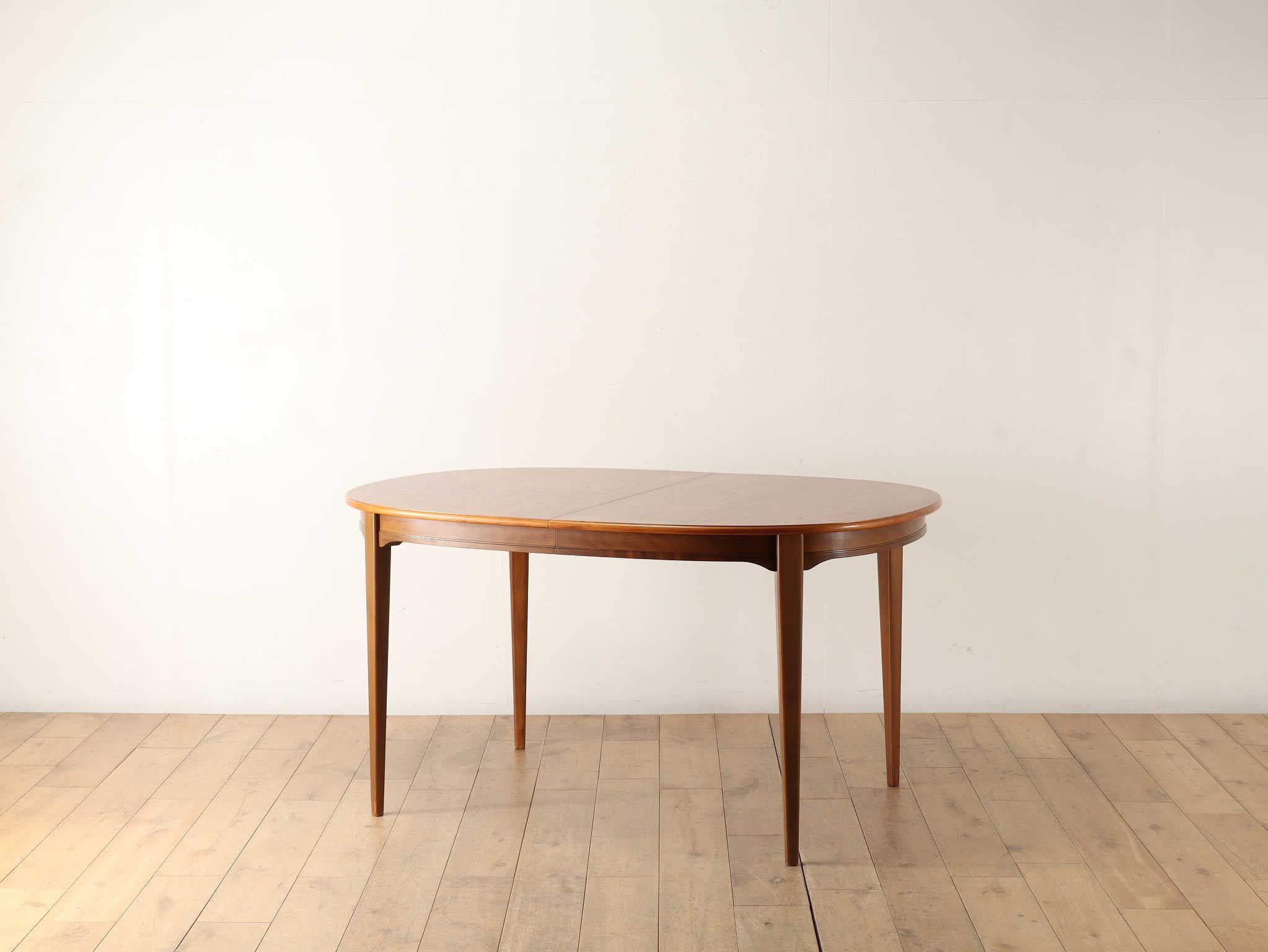 Dining table designed by Swedish designer Svante Skogh in the 1960s.The table can be enlarged up to 2400 mm by inserting two boards in the centre of the top, so that it can be used for up to 10 people depending on the arrangement of the chairs.It