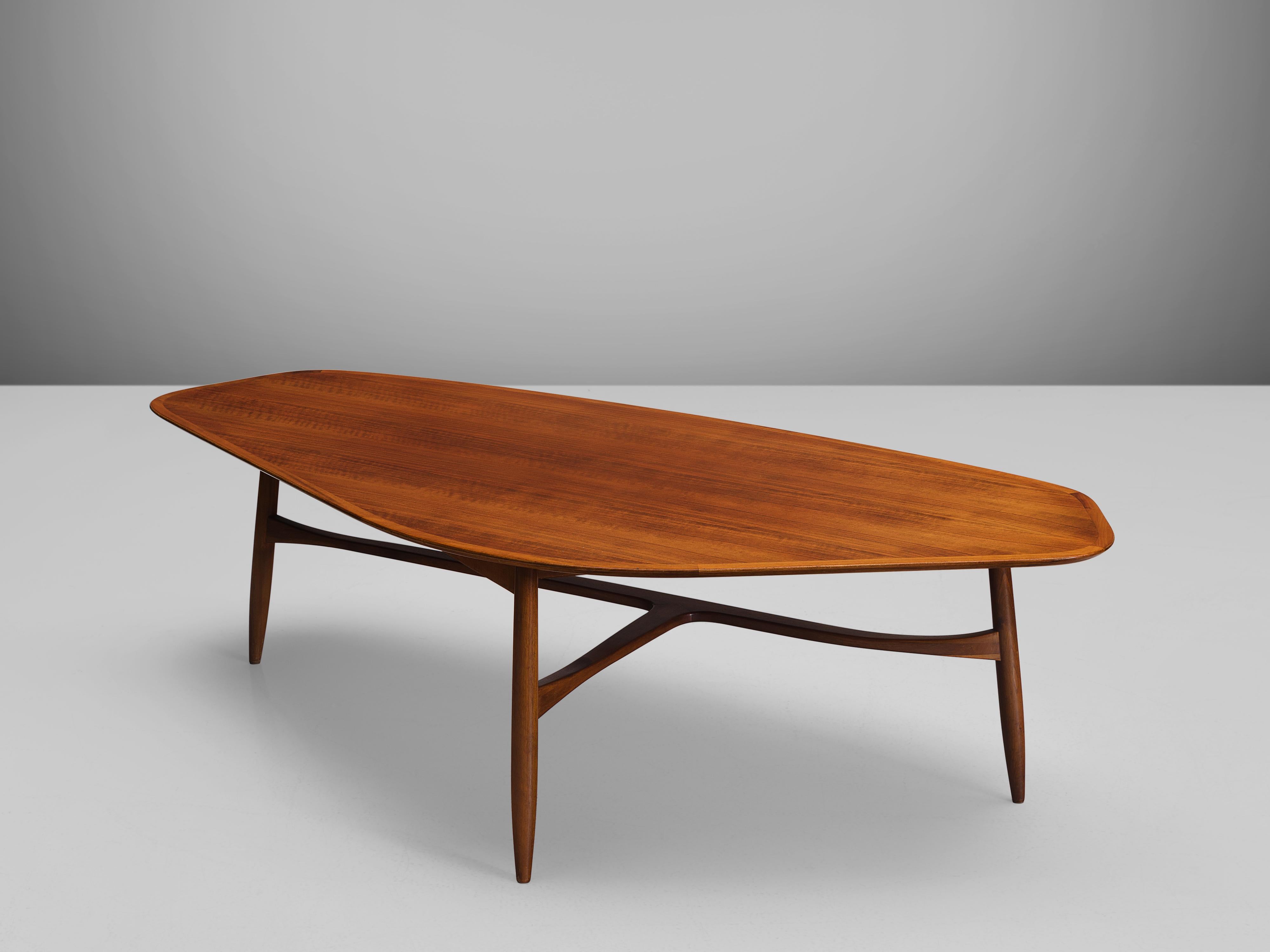 Svante Skogh, coffee table, walnut, Sweden, 1950s

This freely shaped coffee table with three thin tapered legs is part is beautifully shaped and shows high attention to detail, especially by means of the connecting tripod slat between the legs.
