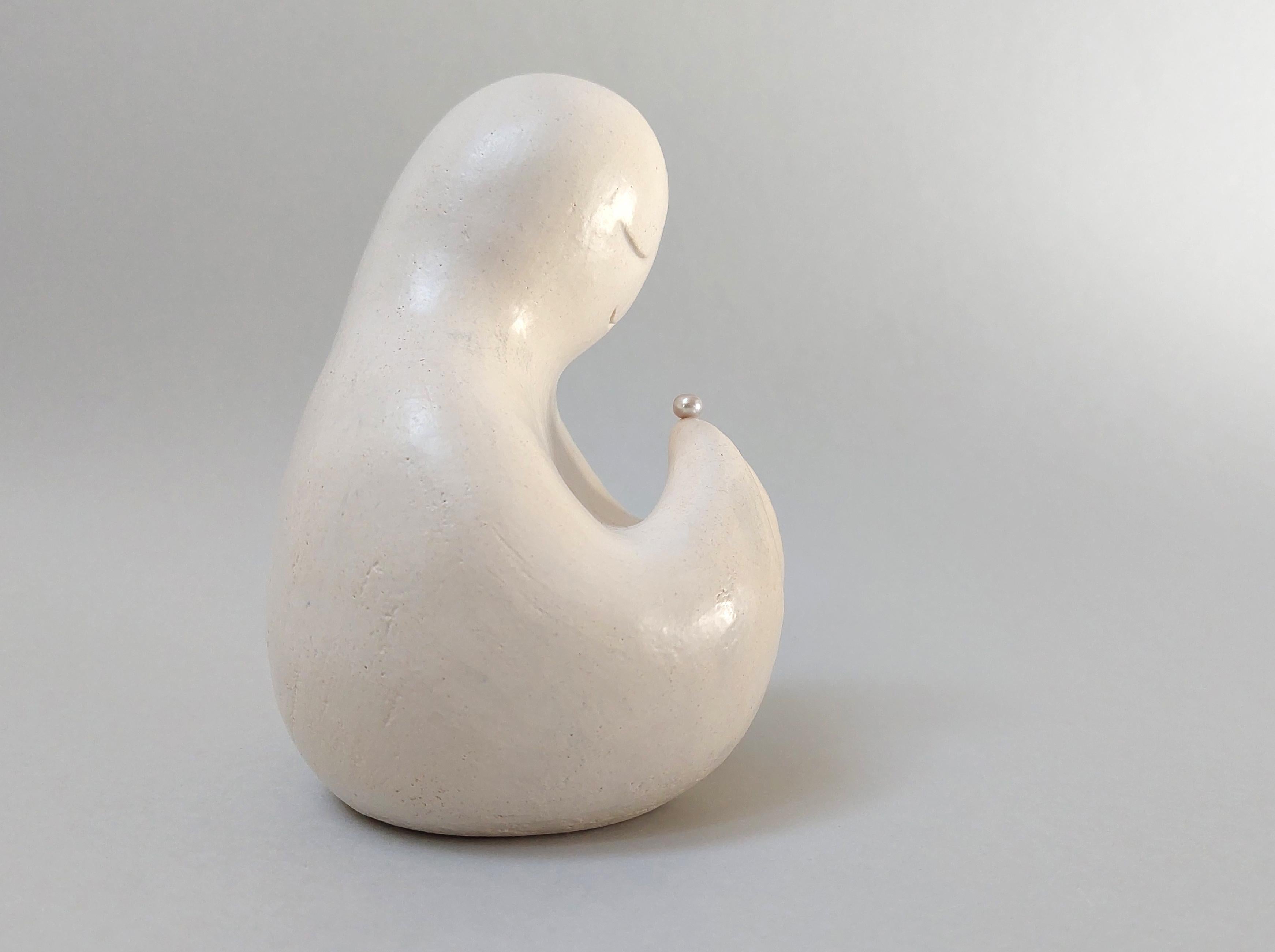 Figurative Ceramic Sculpture. Pearl.
During the course of life, each of us tries to find something valuable in the outside world. But there comes a moment when a person realizes that the real treasure is inside..... He admires its beauty, feels calm