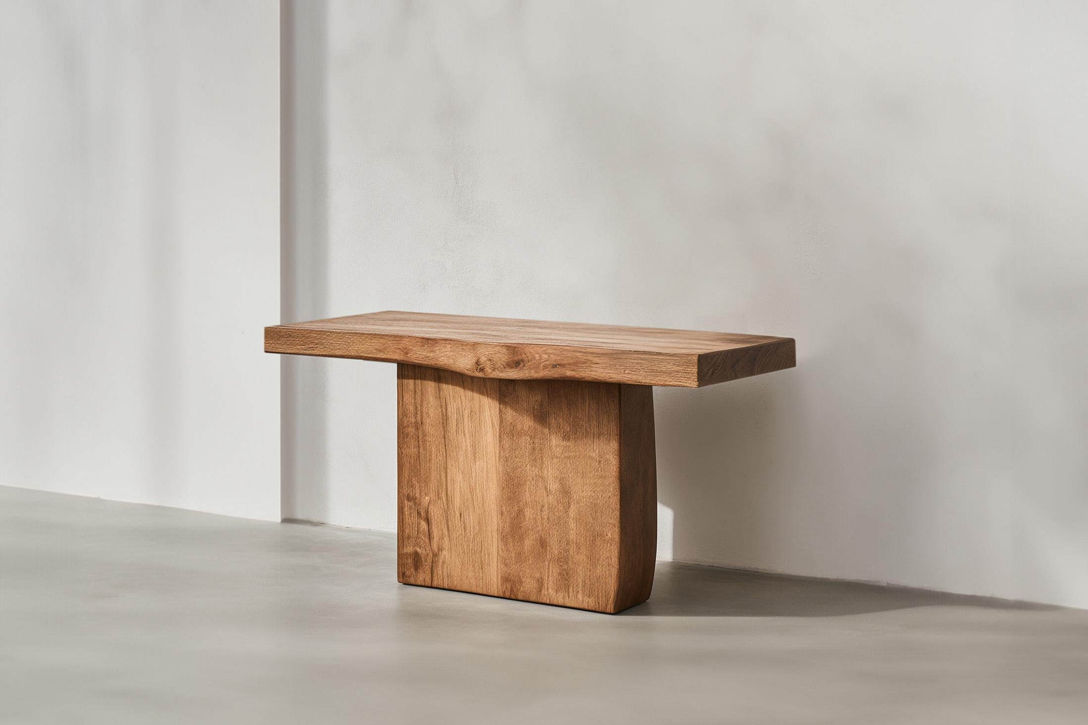 Svelte Elefante Console 18, NONO Design, Tactile Oak Finish
—————————————————————
Elefante Collection: A Harmony of Design and Heritage by NONO

Crafting Elegance with a Modernist Touch

NONO, renowned for its decade-long journey in redefining