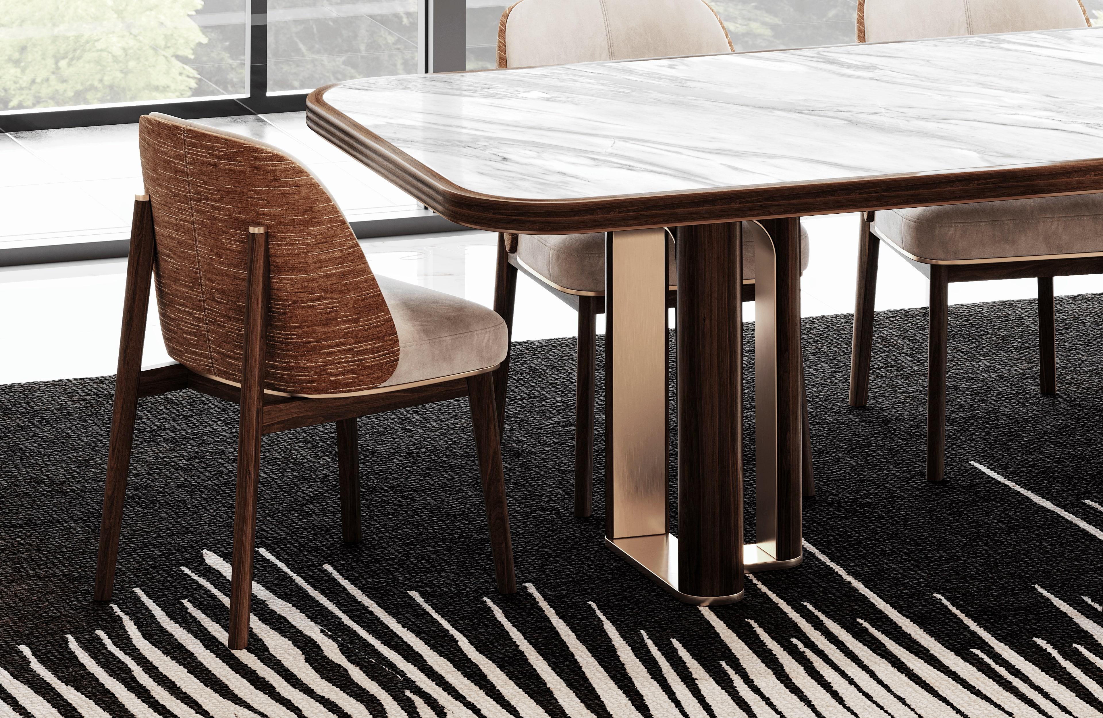 Elise chair is a portrait of refined elegance and modern comfort, designed to elevate any dining setting. Its gracefully contoured backrest and plush, cushioned seat offer exceptional support and comfort, ensuring a delightful experience during