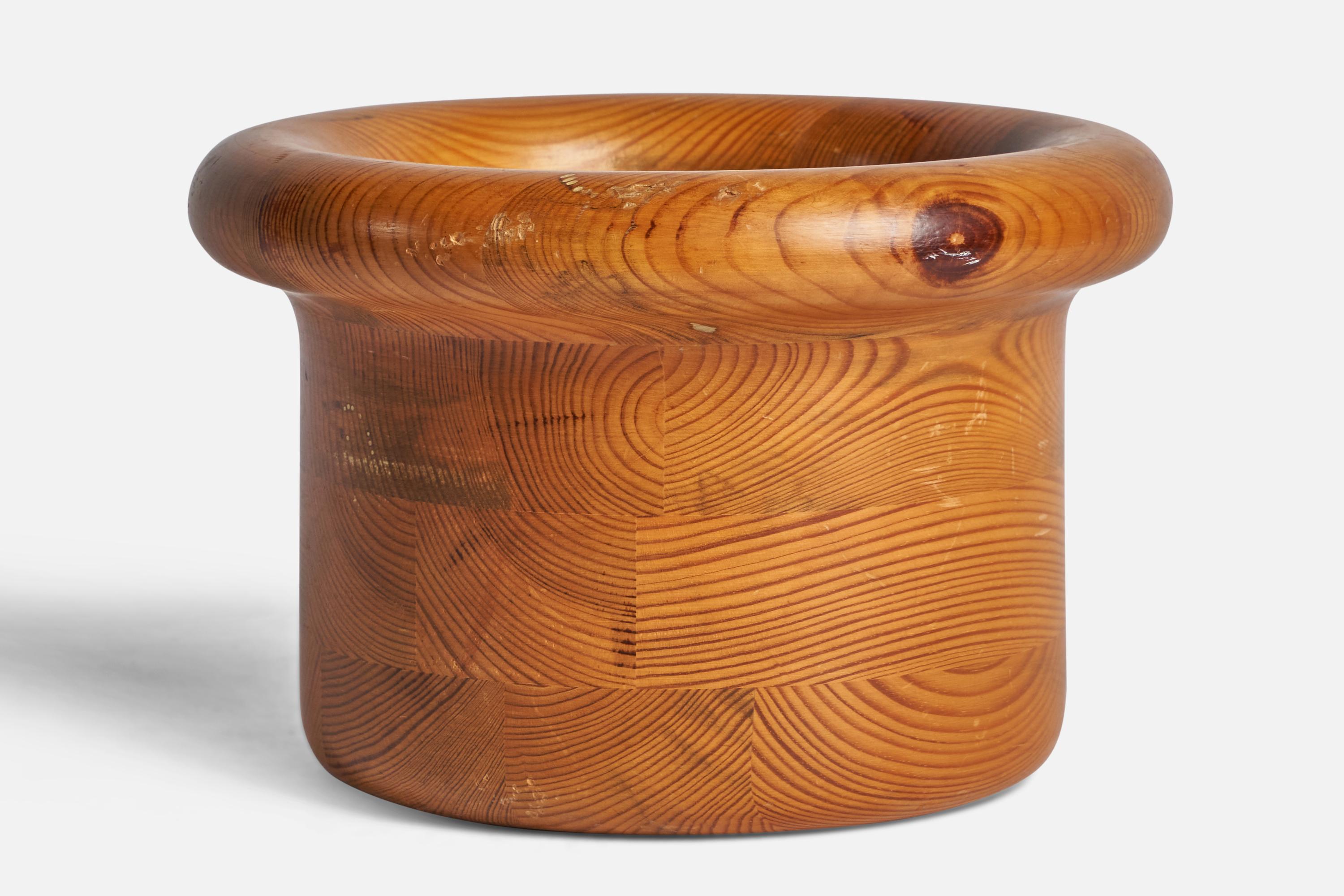 A laminated solid pine bowl designed by Sven and Christer Larsson and produced by Möbel-Shop, Sweden, 1970s.
“Möbel Shop — Form Sven and Christer Larsson” sticker on bottom