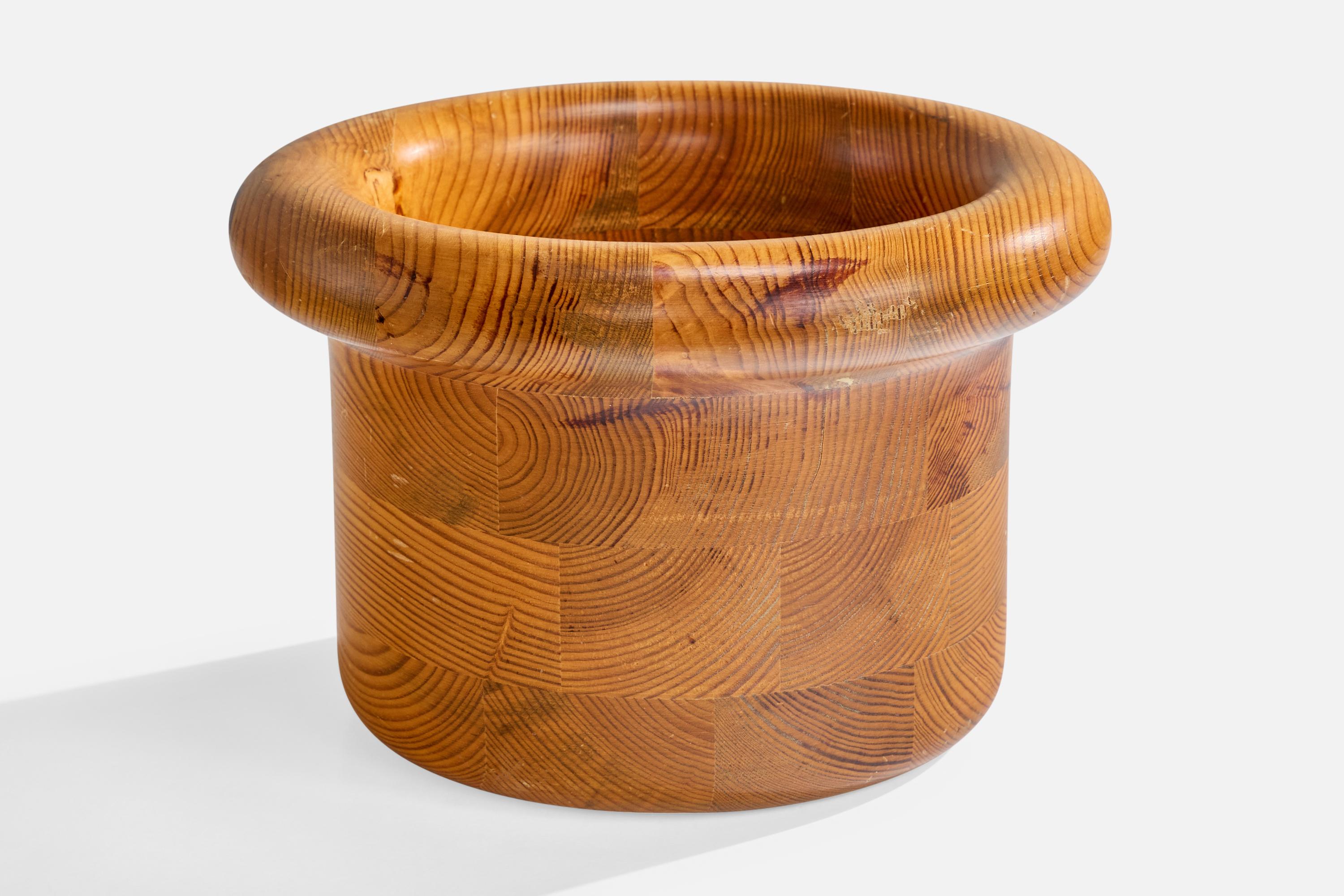 A pine bowl designed and produced by Sven & Christer Larsson, Sweden, c. 1970s.

Scratching and other wear present to wood consistent with age and use

Overall Dimensions (inches): 7.25