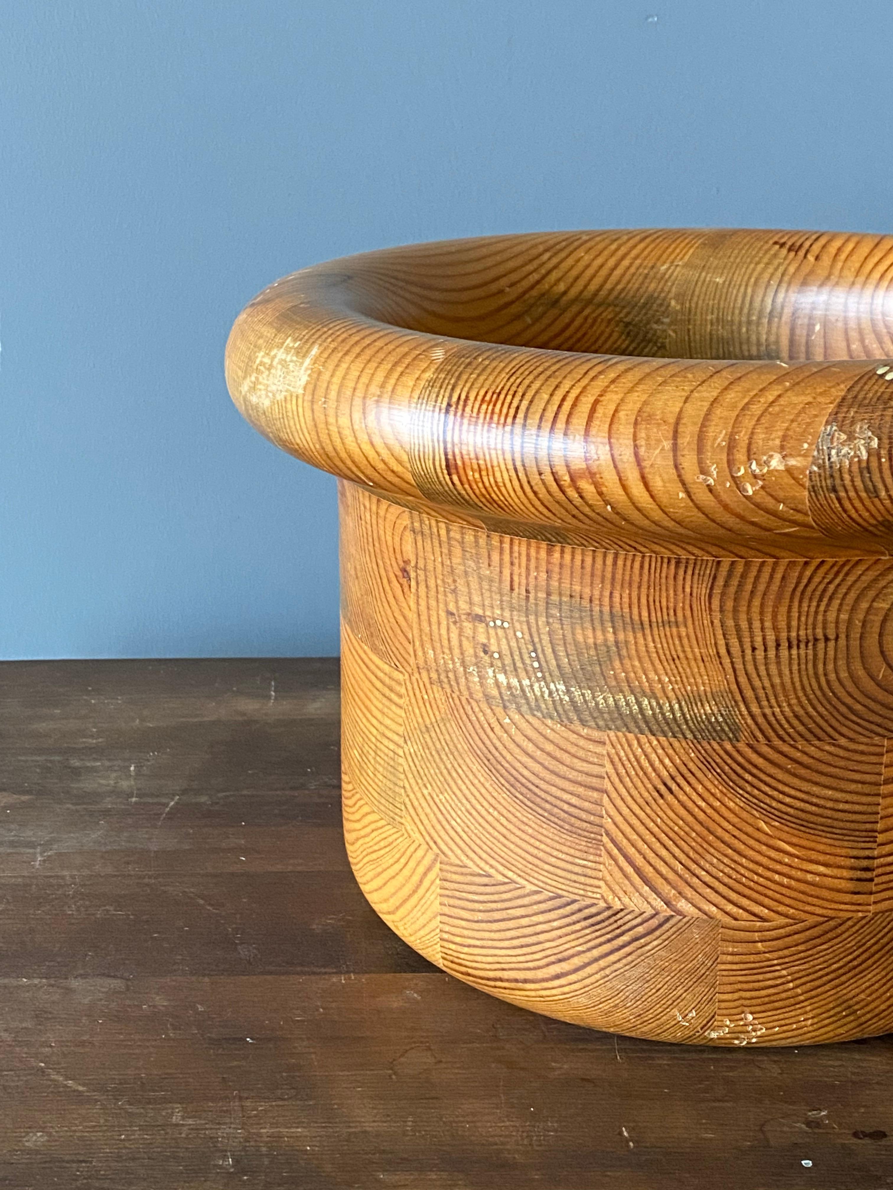 A sizable bowl designed and produced by Sven & Christer Larsson for their own firm Sven Larsson Möbelshop, Sweden, 1970s. In finely laminated and turned pine. 

 