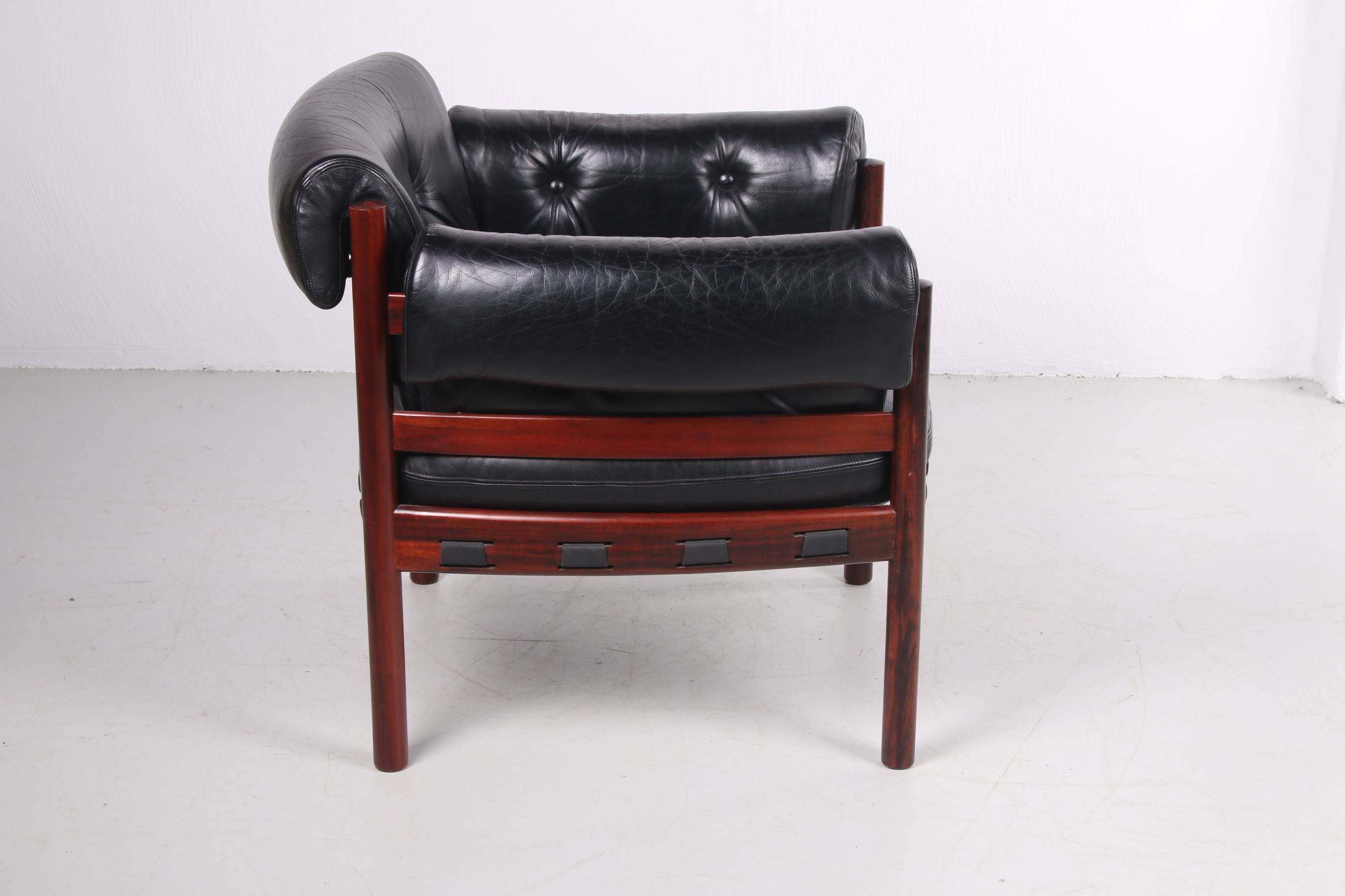 Swedish Sven Ellekaer for Coja black leather armchair 1970s