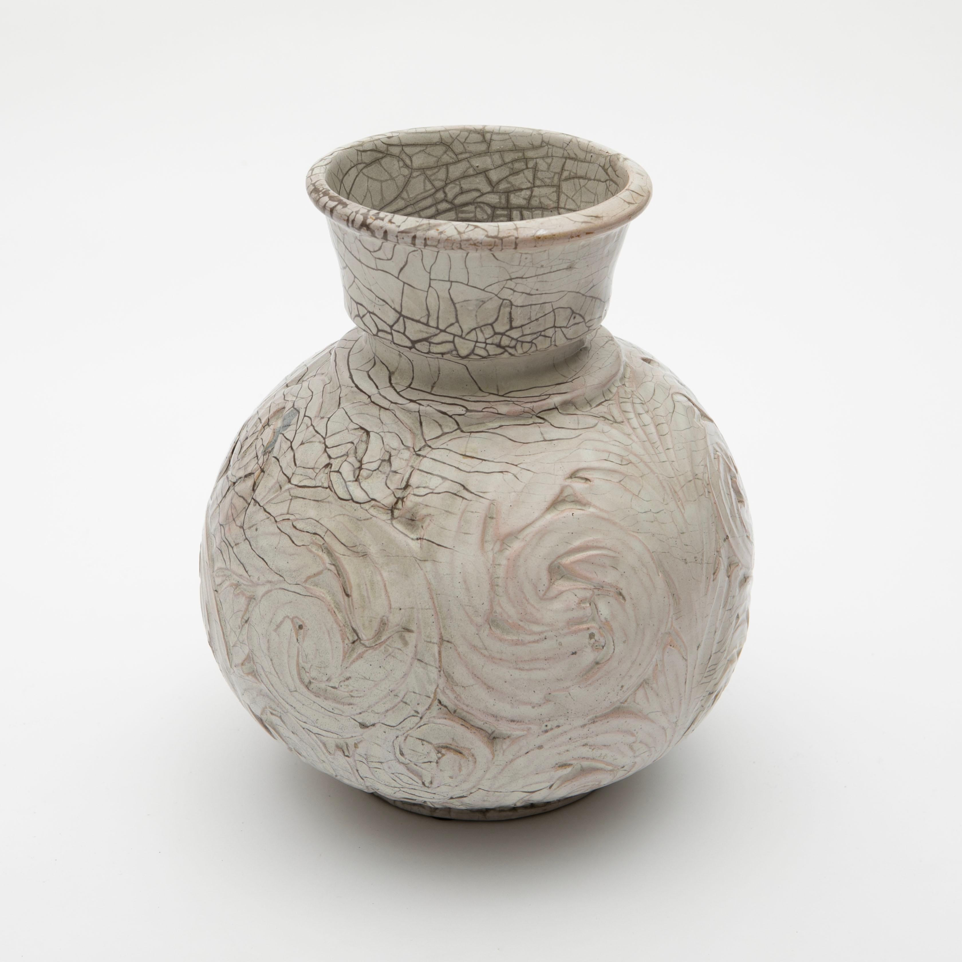 Sven Hammershøi Danish, 1873-1948
Unique ceramic vase created by Sven Hammershøi for Kähler in the 1920s.
This striking vase features sculpted organic patterns in a white glaze, accented with subtle tones of pink and brown that enhance its dynamic