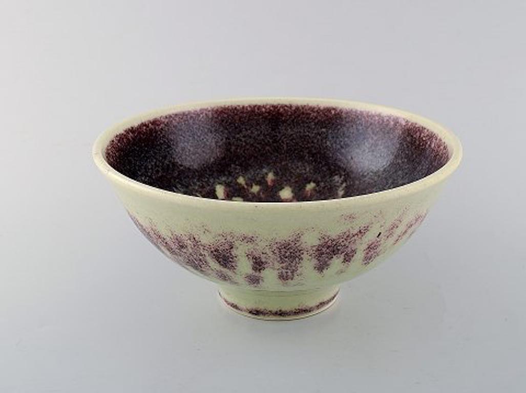 Sven Hofverberg (1923-1998) Swedish ceramist.
Unique Ceramic bowl in light and blue violet nuances.
Stamped. Sweden 1970s-1980s.
In good condition. Minor burning mark at the bottom.
Measures: 22 x 10.5 cm.