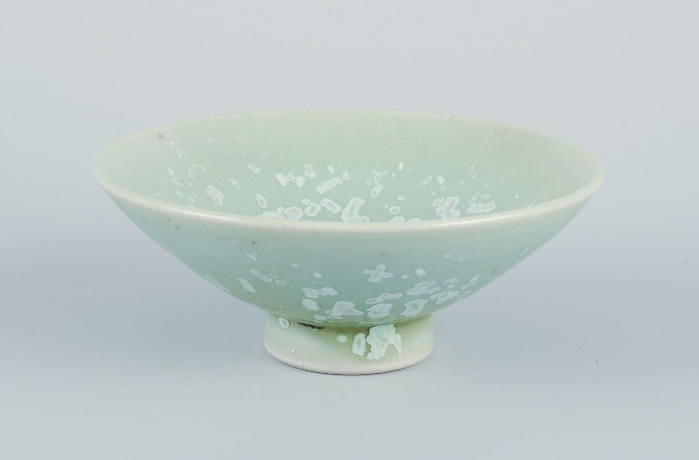 Pre-owned goods are exempt from import duties for U.S. customers. 
Therefore, no import tariffs will be applicable to your purchase.

Sven Hofverberg, Swedish ceramicist, own studio.
Unique ceramic bowl.
Mint green glaze with crystals.
Late 20th