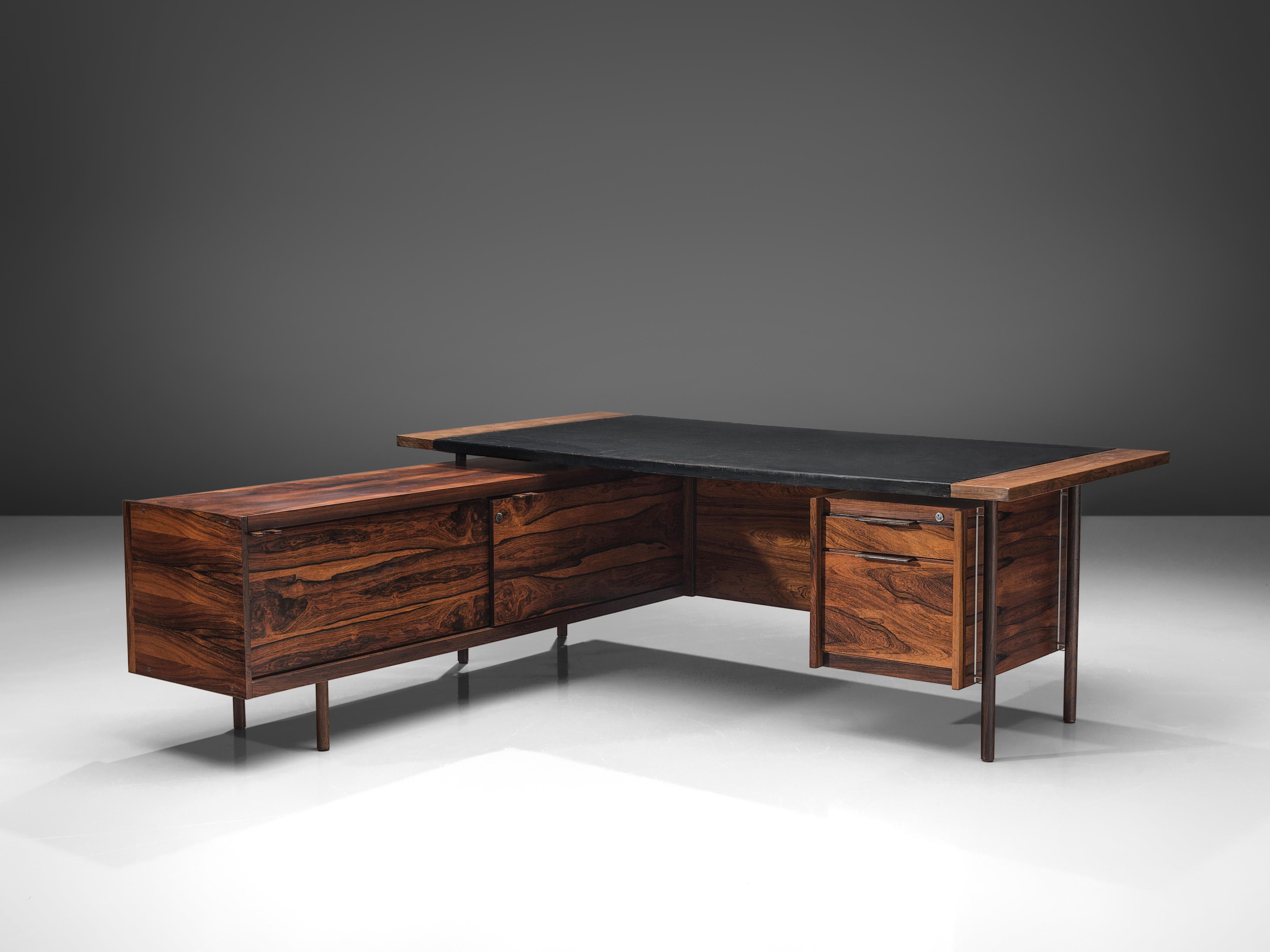 Sven Ivar Dysthe for Dokka Mobler, desk in rosewood, leather and Lucite, Norway, 1960s. 

This well-crafted executive desk in rosewood is designed by Sven Ivar Dysthe. The clear, modest design of this well-proportioned desk with left positioned