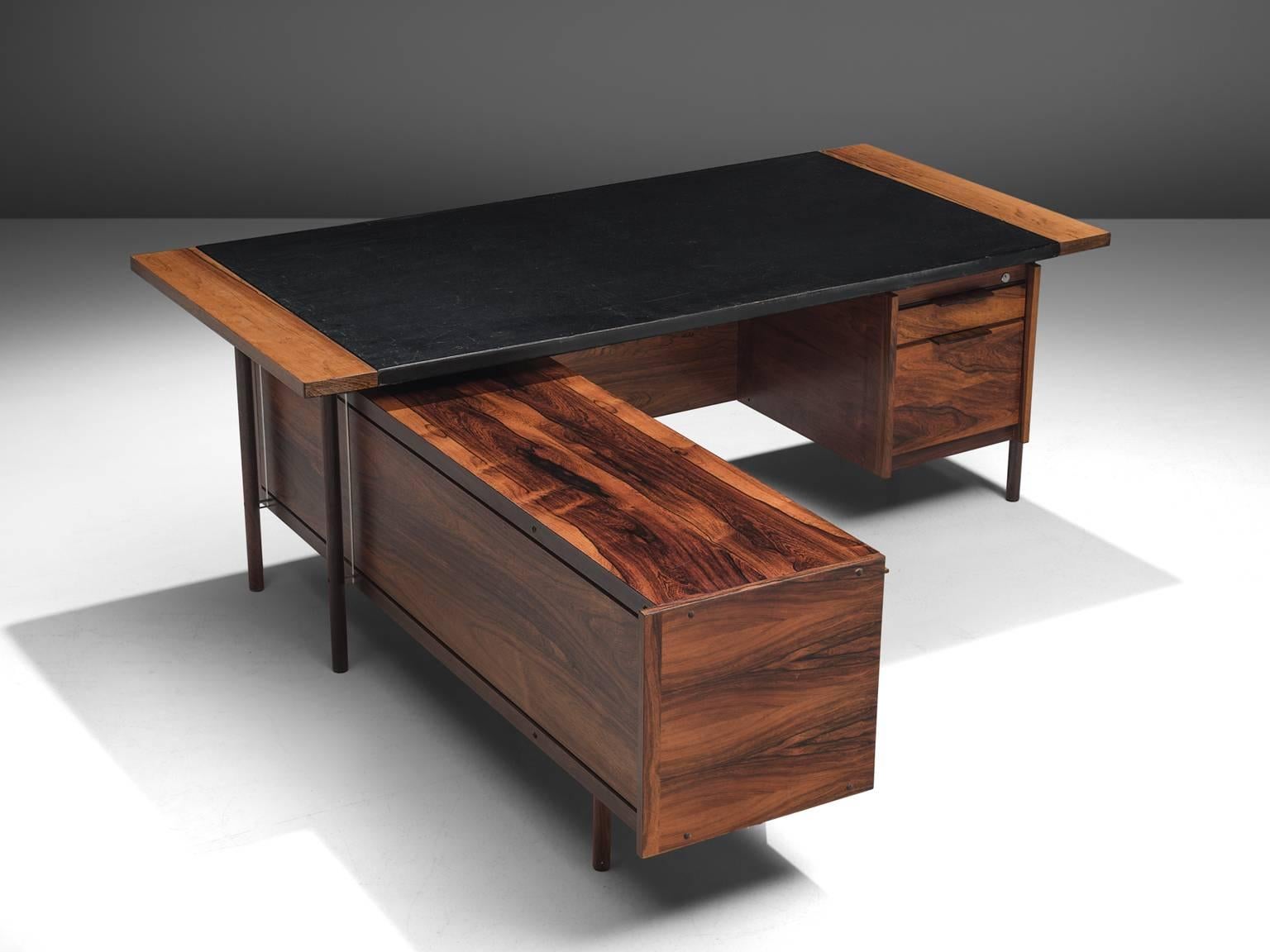 Sven Ivar Dysthe for Dokka Mobler, desk in rosewood, leather and lucite, Norway, 1960s. 

This well crafted executive desk in rosewood is designed by Sven Ivar Dysthe. The clear, modest design of this well proportioned desk with left positioned
