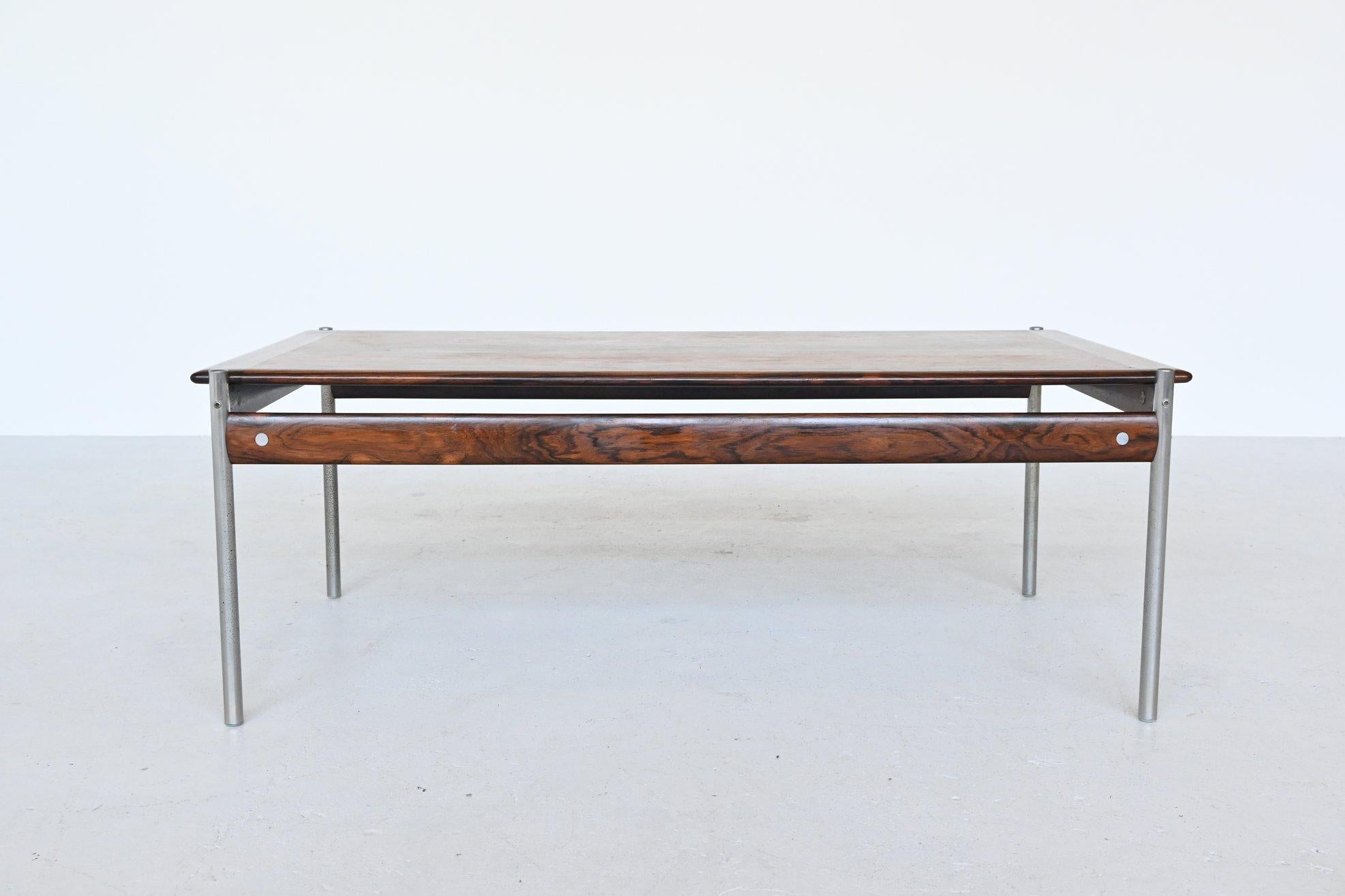 Stunning coffee table from 1001 series designed by Sven Ivar Dysthe for Dokka Mobler, Norway, 1957. This beautiful coffee table is executed in high quality beautiful grained rosewood and tubular steel legs. All parts are of a distinctly high quality