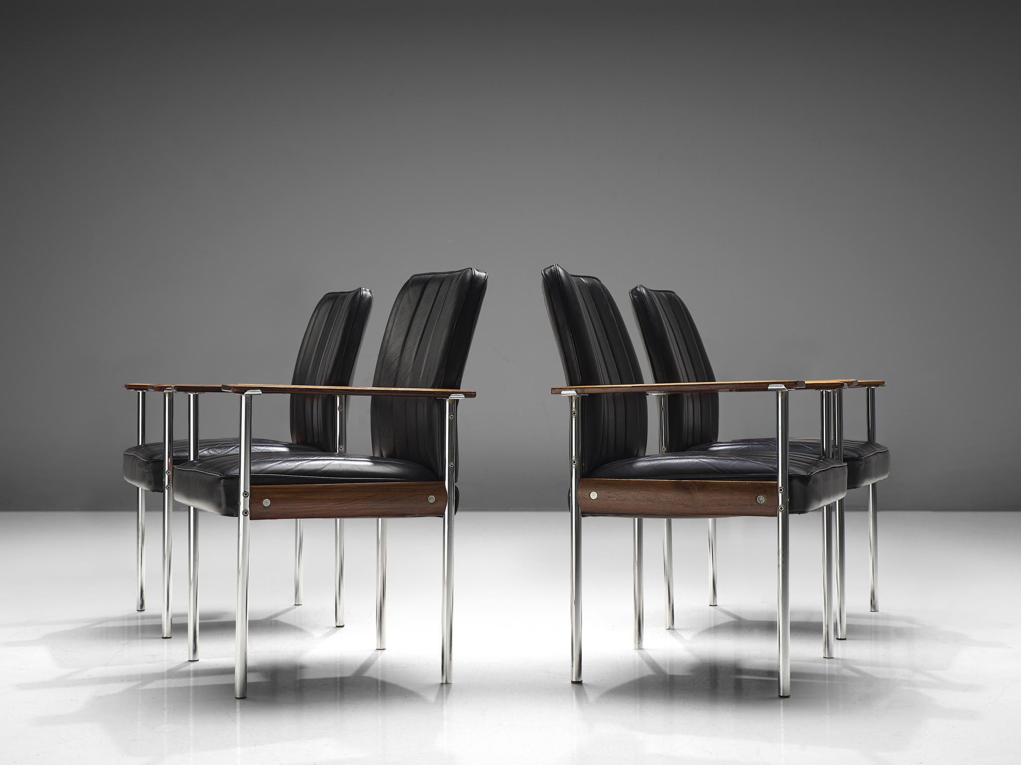Sven Ivar Dysthe for Dokke Møbler, dining chairs, black leather, steel, rosewood, Norway, circa 1959. 

This well crafted office chairs is designed by Sven Ivar Dysthe. The base of these office chairs is made out of rosewood, stainless steel pieces