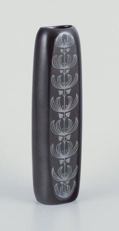 Sven Johnson for Gustavsberg. “Facett” ceramic vase. Motif of peacock.