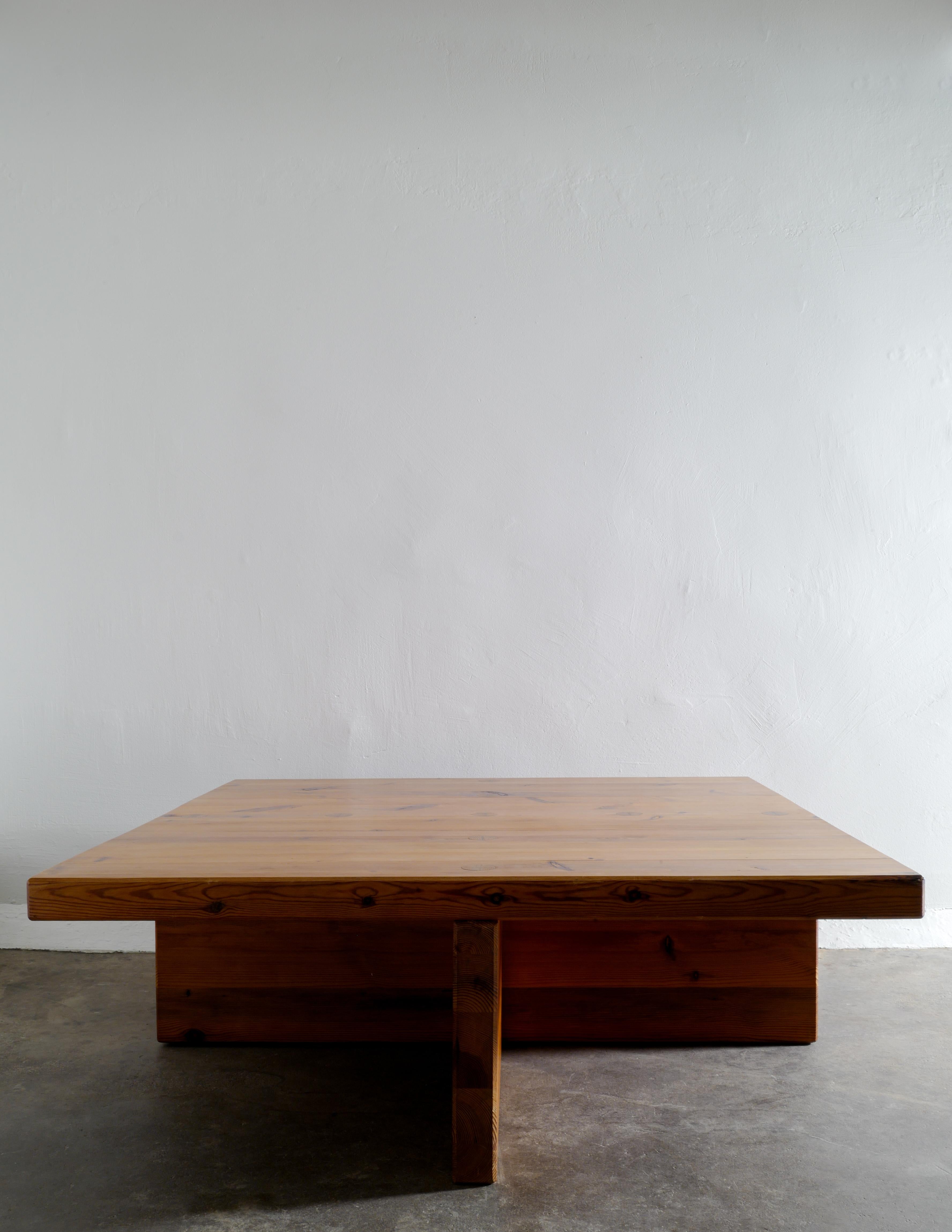 Rare coffee sofa table in solid stained pine designed by Sven Larsson and produced in the early 1970s. In good vintage and original condition with signs from age and use. 

Dimensions: H: 45 cm W: 130 cm D: 130 cm.