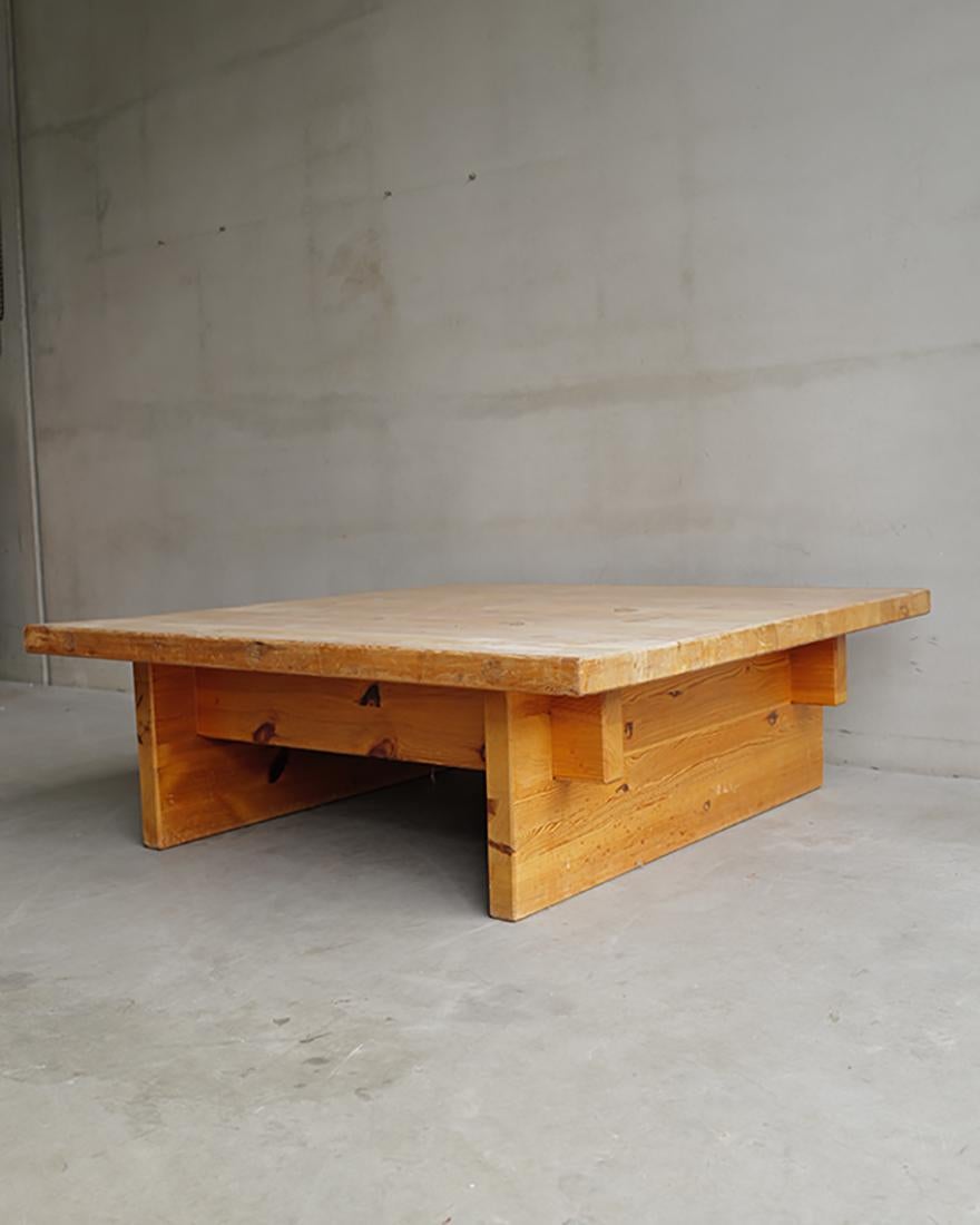 Large square coffee table in solid pine, made by Sven Larsson in 1970s.  

A great item for a timeless interior. The 1960s marked a turning point in Larsson's career as he became recognized as a pioneer of Scandinavian modernism, especially through