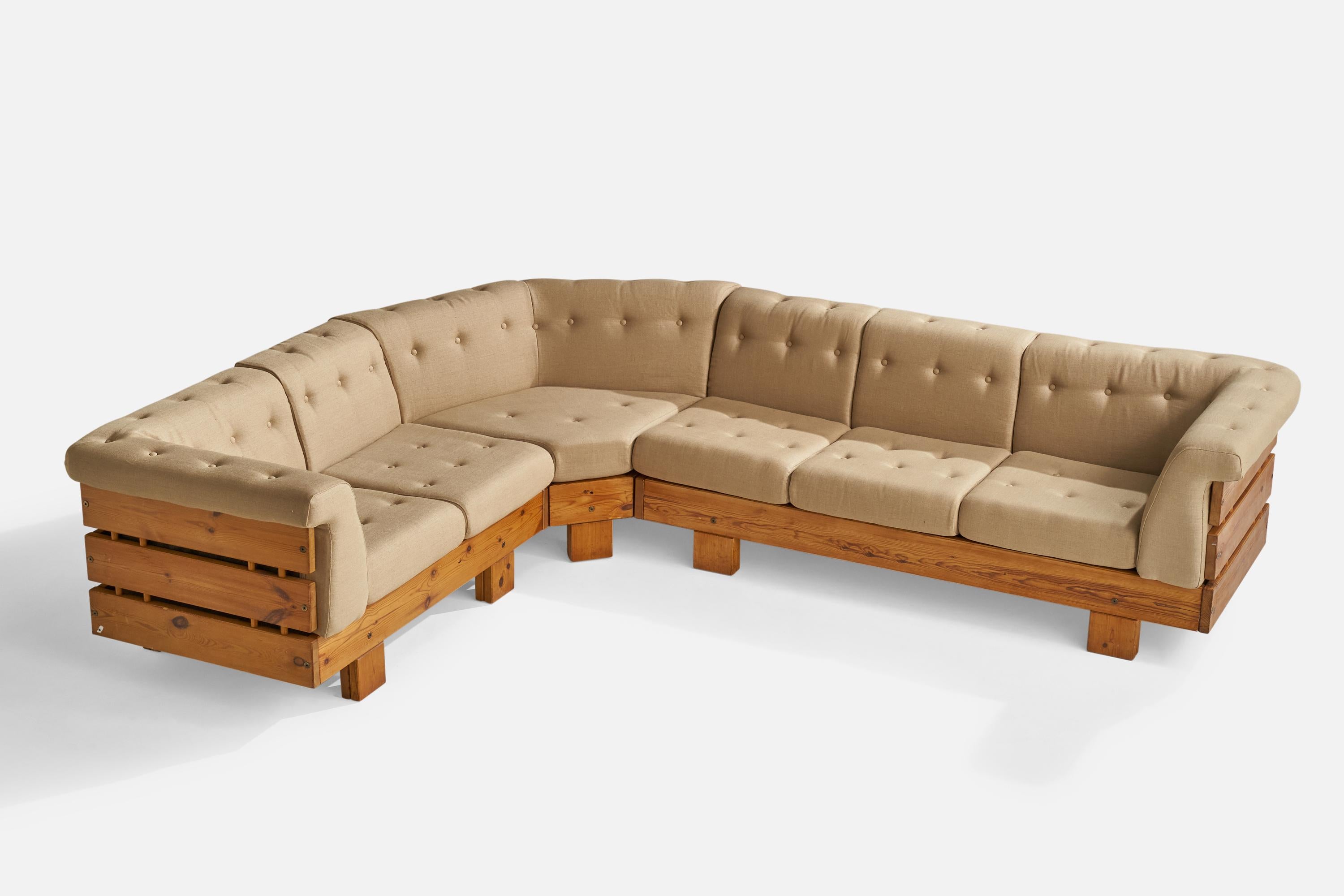 A large pine and beige fabric sectional sofa designed by Sven Larsson and produced by Sven Larsson Möbelshop, Sweden, 1970s.

Seat height 16.5”

