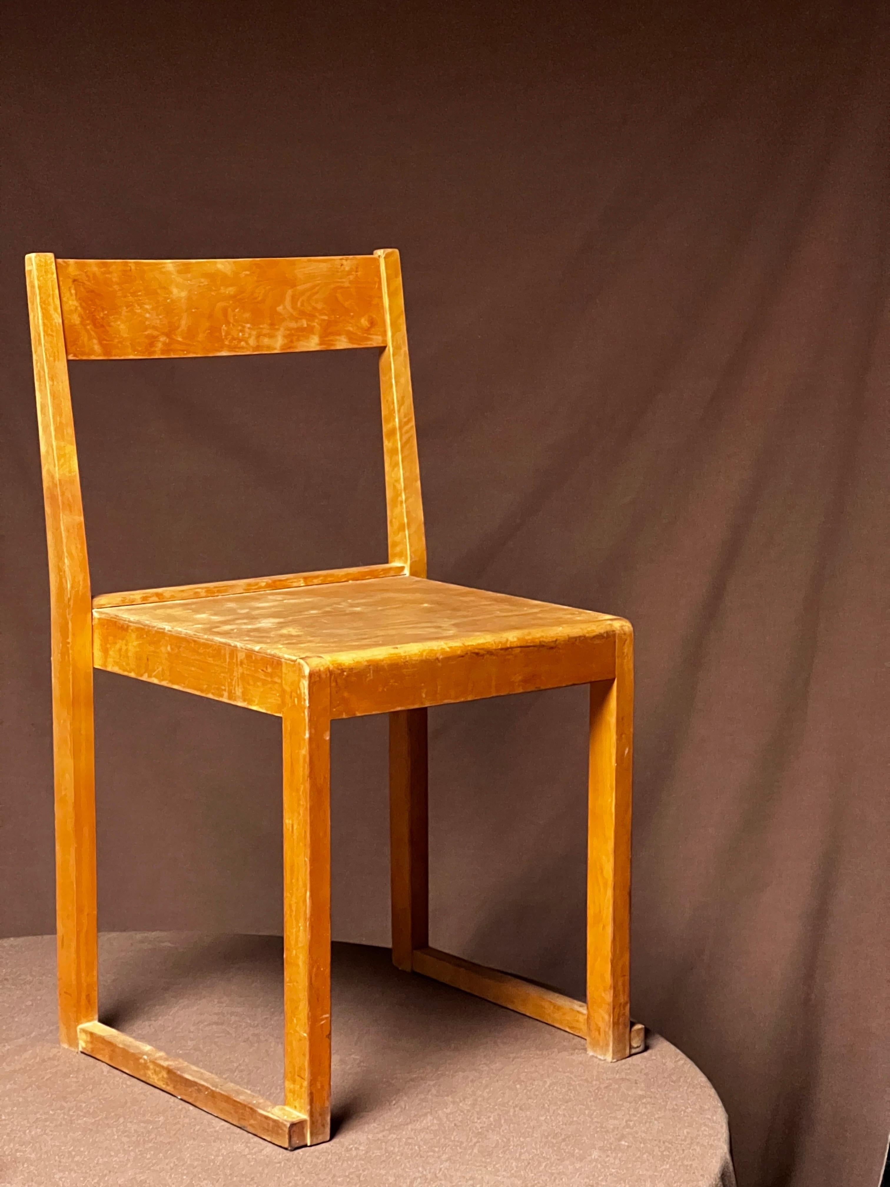 Original, minimal and elegant lightweight confortable stacking chair by modernist architect Sven Markelius. Designed and produced for the orchestra of the Helsingborg theater in Sweden in 1931. This one has honey  birch wood in good condition. We
