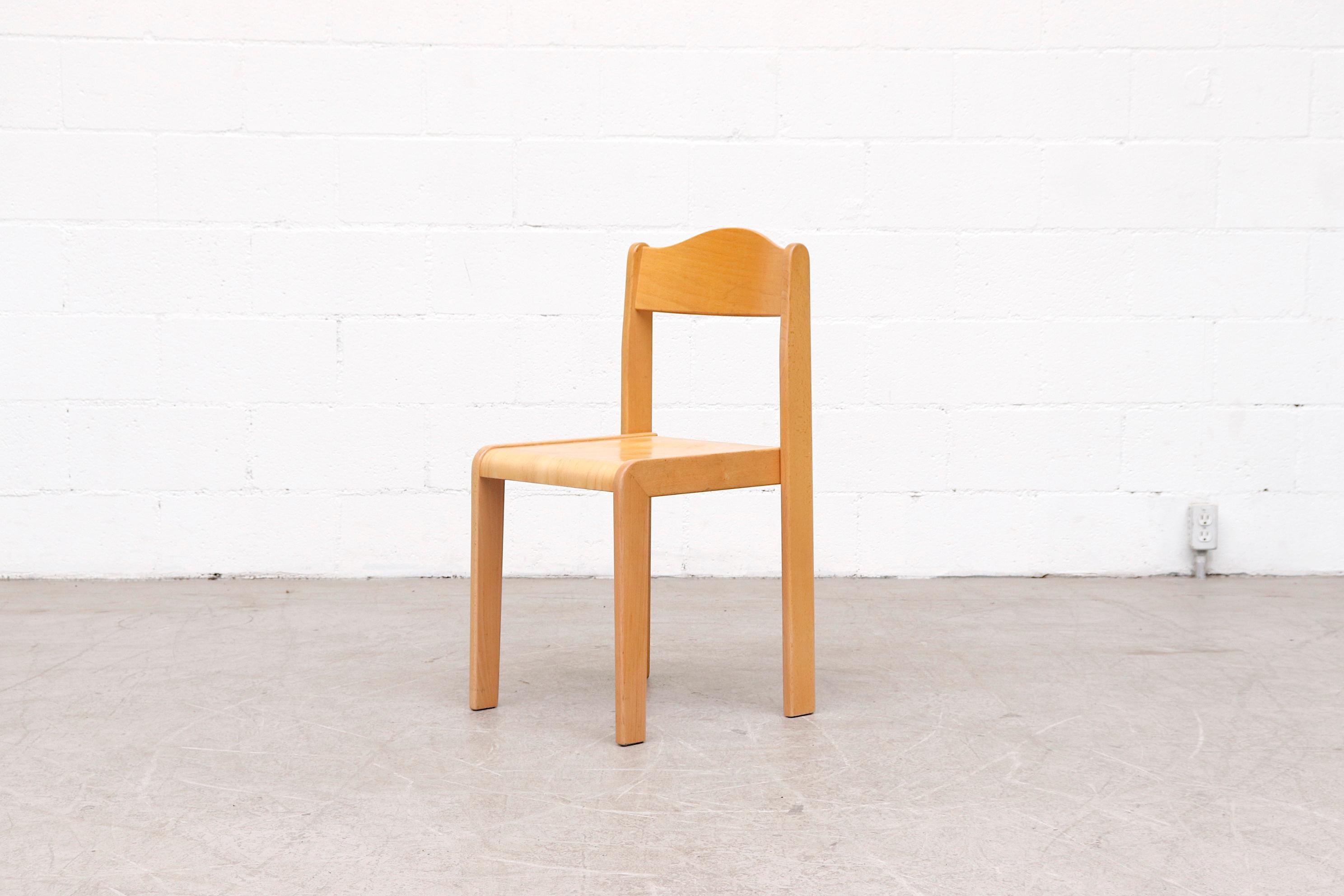 Sven Markelius style birch stacking chairs with flat seat backs. In original condition with visible wear and use. Lead time from time of order is 10 days.