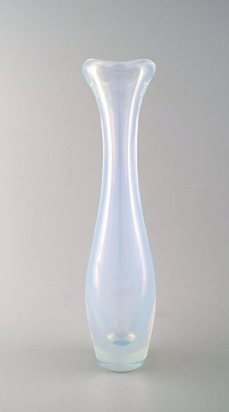 Sven Palmqvist for Orrefors, a Selena vase, circa 1954, light blue opaline glass of elongated organic form.
Engraved to the base pw 3090/5.
31 cm. high. 
Note: see McConnel, A. 2006, 20th Century Glass, p.193, for an example of this vase