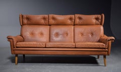 Sven Skipper 1960s Danish Three Person Coupe Wingback Sofa in Cognac Leather