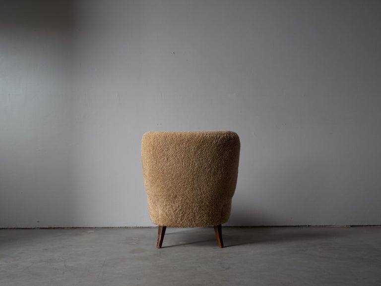 Scandinavian Modern Sven Staaf, Lounge Chair, Beige Shearling, Wood, Sweden, 1940s For Sale
