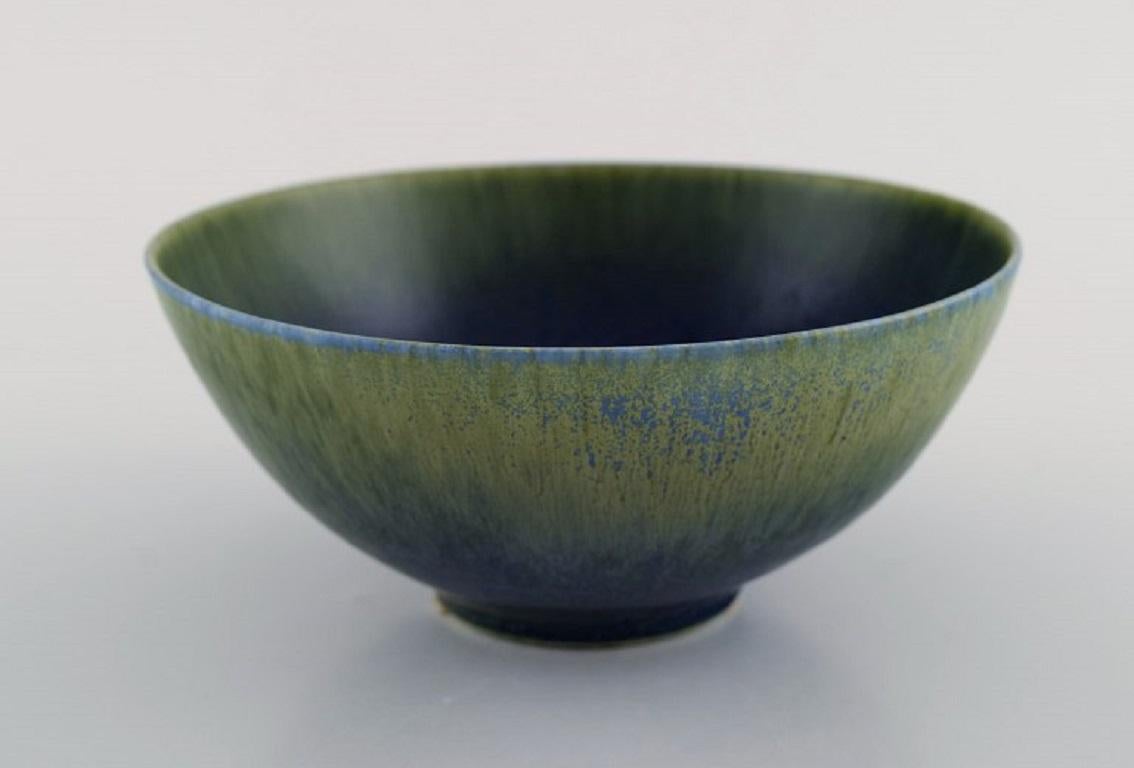 Sven Wejsfelt (1930-2009), Gustavsberg Studiohand. Unique bowl in glazed ceramics.
Beautiful glaze in blue-green and earth tones. Dated 1980.
Measures: 14.8 x 6.5 cm.
In excellent condition.
Signed and dated.