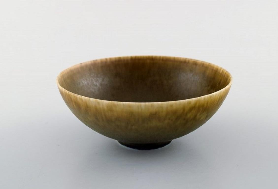 Sven Wejsfelt for Gustavsberg Studio. 
Unique bowl in glazed ceramics, 1989. 
Beautiful glaze in green and yellow shades.
Signed.
In very good condition.
Measures: 11 x 4.5 cm.