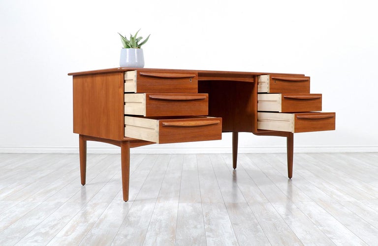 Mid-Century Modern Svend A. Larsen Executive Teak Desk with Bookcase For Sale