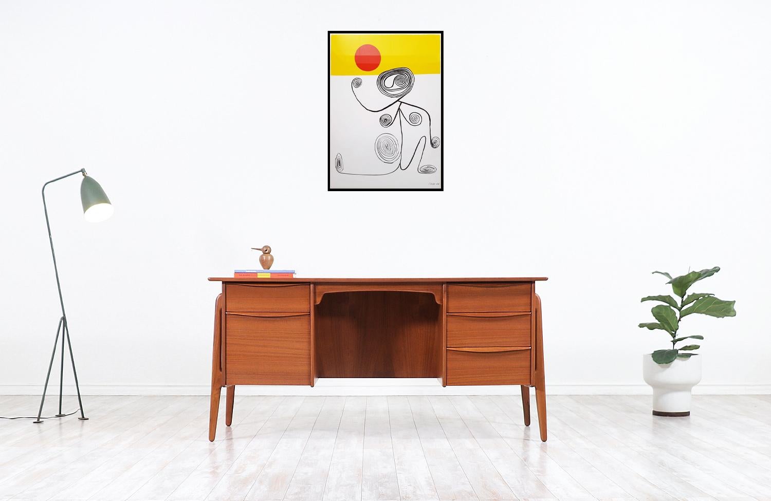 One of our most versatile Danish modern executive desk designed by architect Svend A. Madsen in collaboration with Sigurd Hansen in Denmark circa 1950s. This classic and elegant Danish desk features a solid teak frame with a stunning warm grain