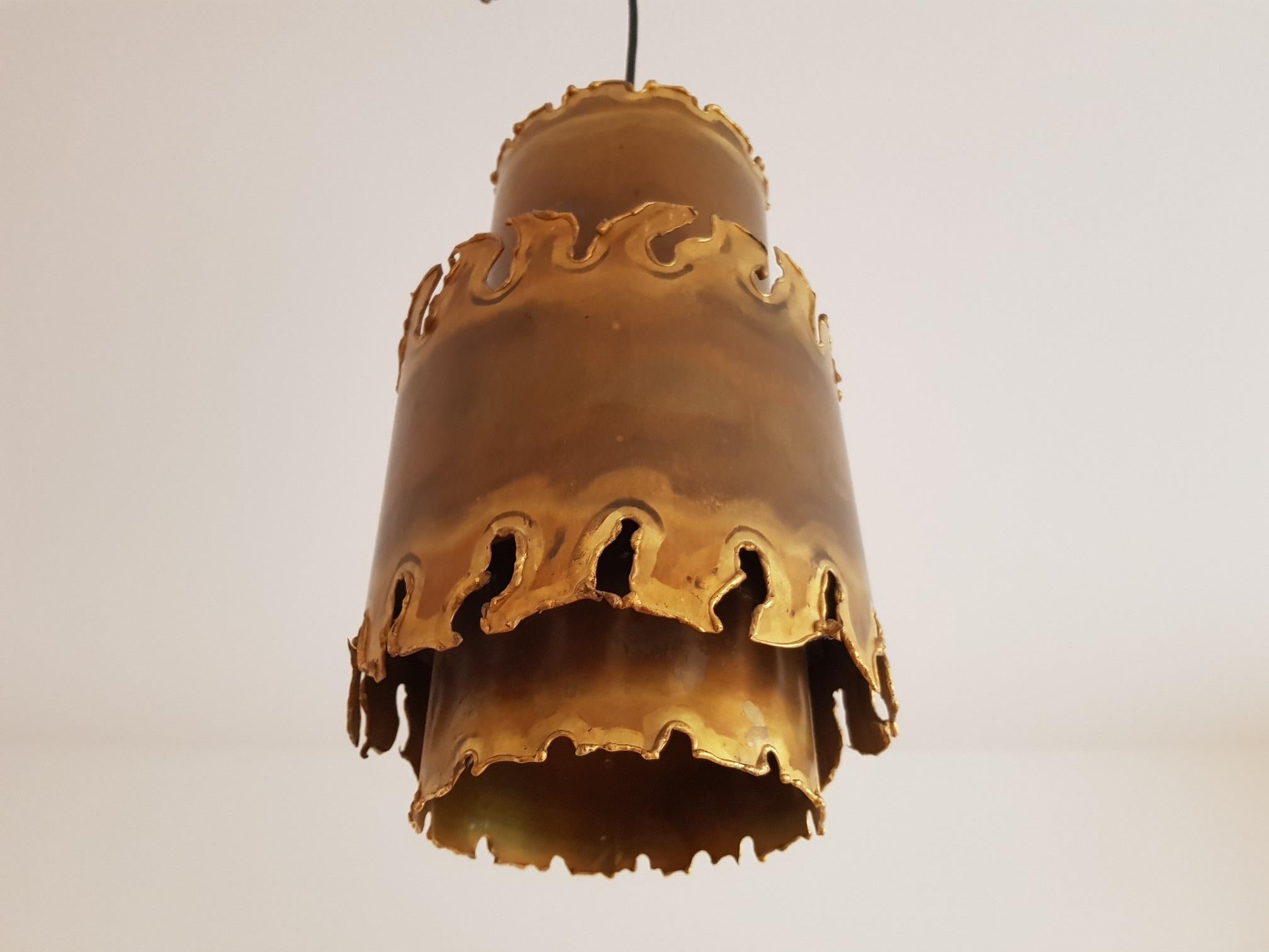 2 vintage cylindrical pendant lights in acid treated brass from the Brutalist series. Produced by Holm Sorensen & Co in Denmark in the 1960s. Designed by Danish artist Svend Aage Holm Sorensen. Iconic design and a proud contribution to the