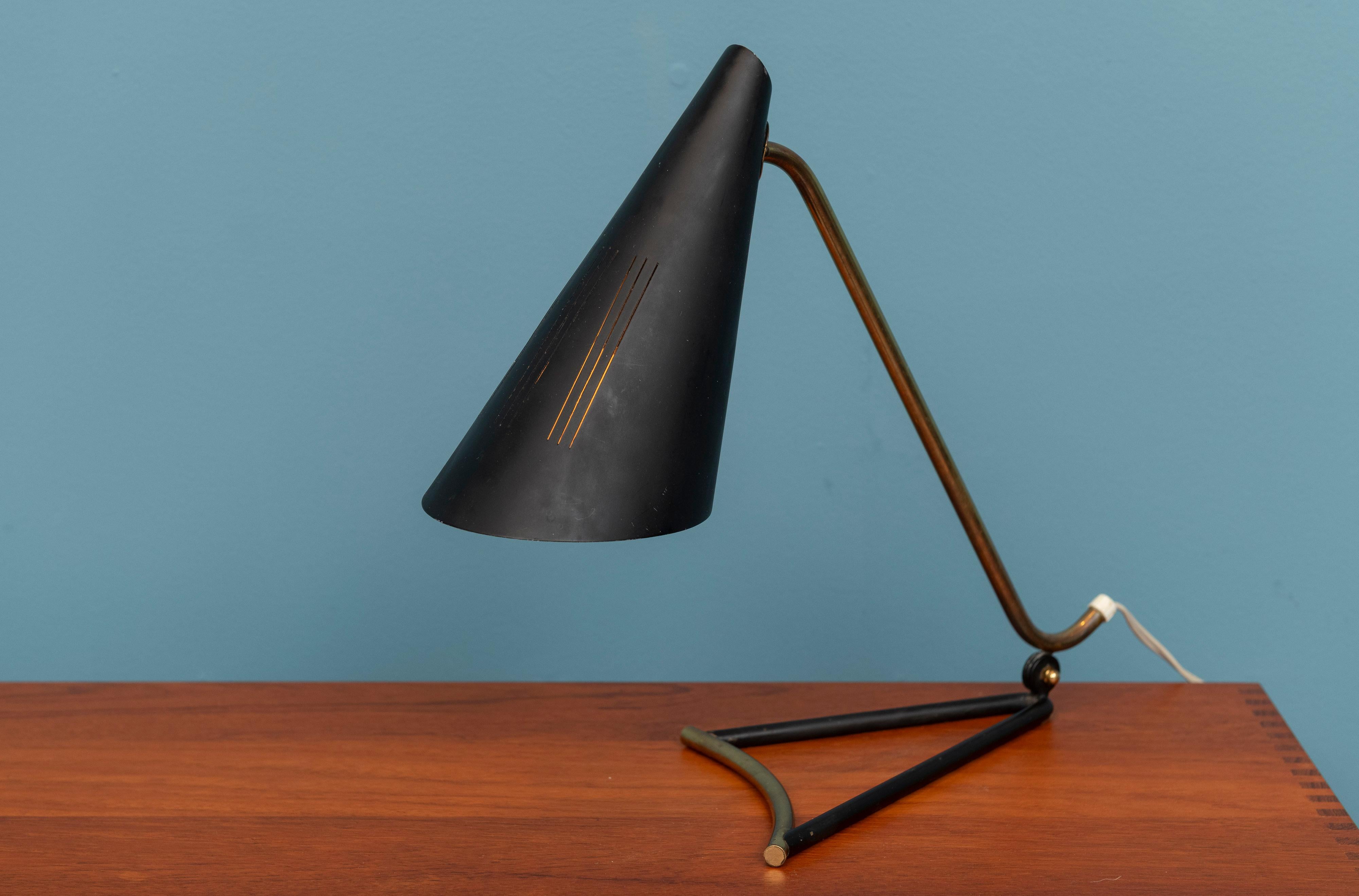 Svend Aage Holm Sorenson adjustable table lamp, Denmark. High quality design lamp, adjustable height made in brass and enameled steel. European wiring with a US adapter works as it should. Perfect for a ask or small console table.