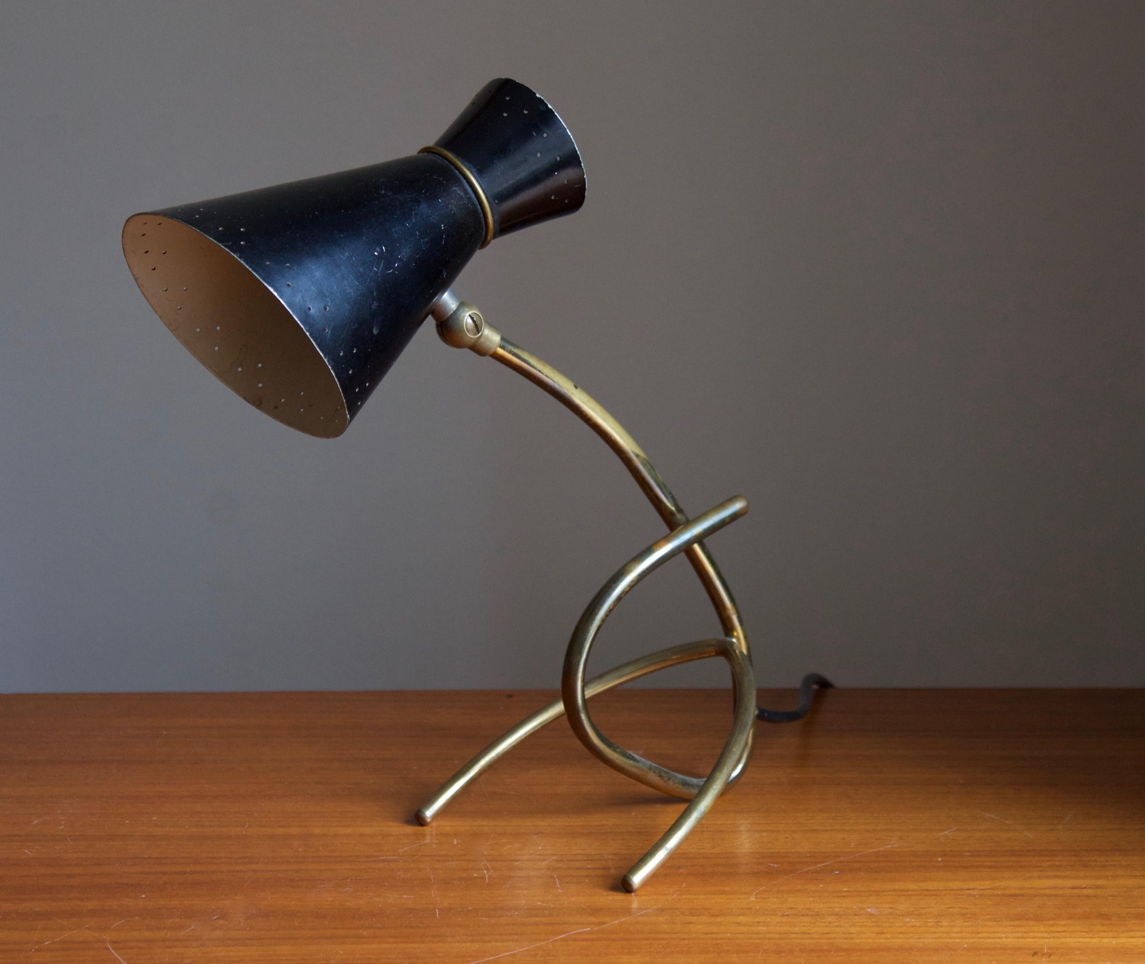 A table lamp / desk light, design is attributed to Svend Aage Holm Sørensen, Denmark, 1950s. Adjustable screen, original black lacquer. 

Other designers of the period include Paavo Tynell, Serge Mouille, Josef Frank, Angelo Lelii, and Lisa