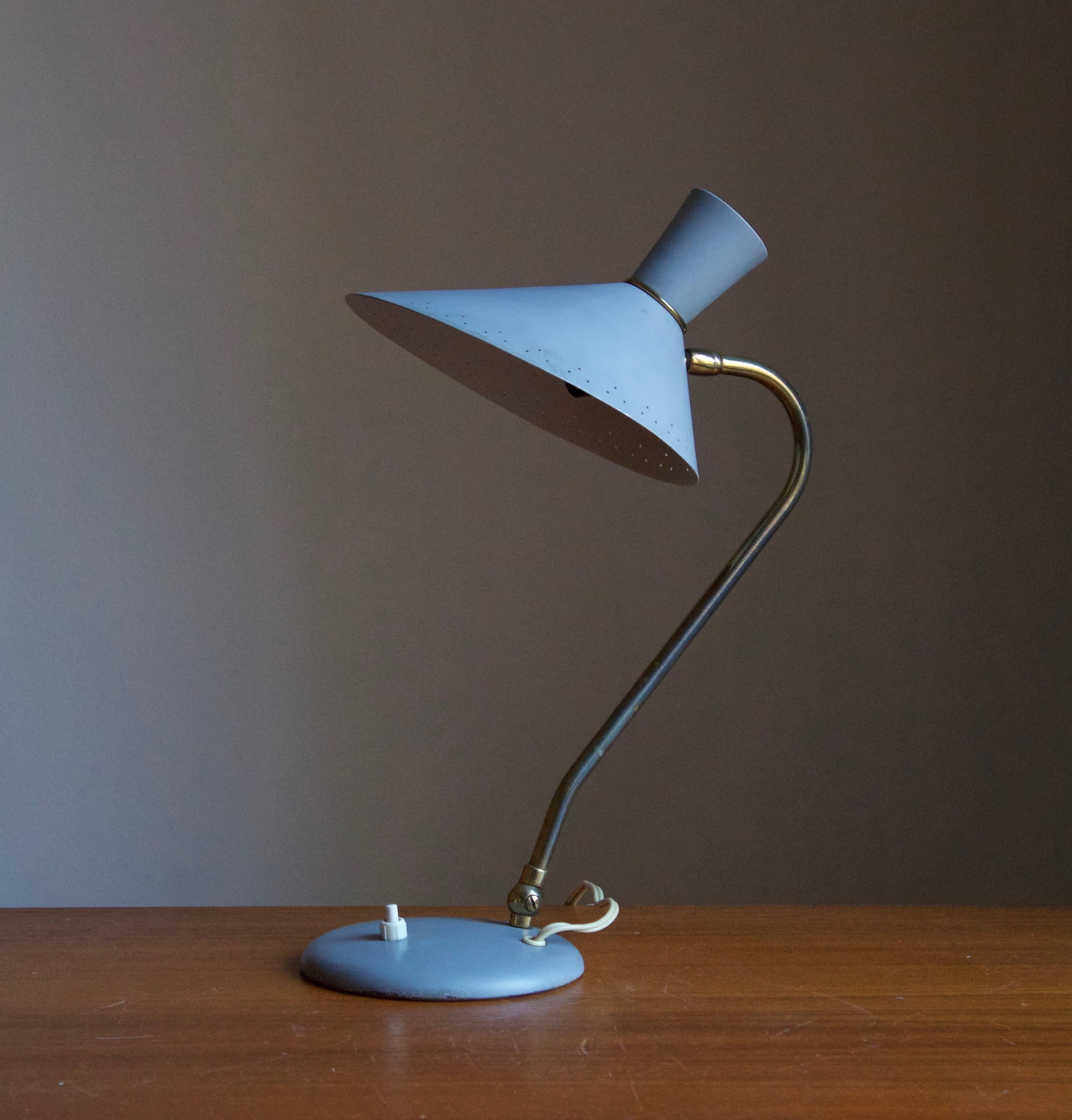 A table lamp / desk light, by Svend Aage Holm Sørensen, Denmark, 1950s. Adjustable screen, original blue lacquer. 

Other designers of the period include Paavo Tynell, Serge Mouille, Josef Frank, Angelo Lelii, and Lisa Johansson-Pape.
