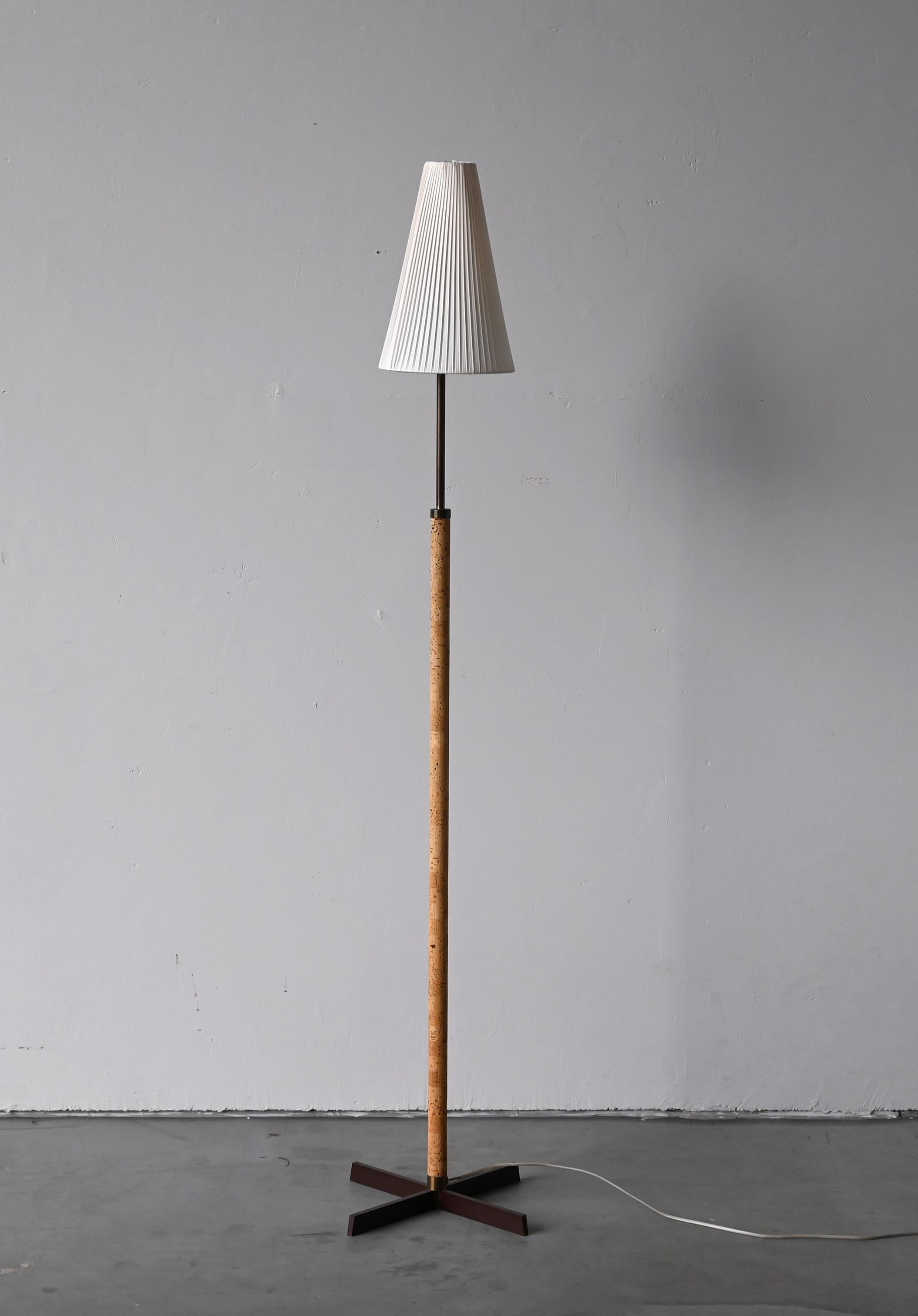 An modernist floor lamp, design attributed to Svend Aage Holm Sørensen, Denmark, 1950s. With lacquered metal base, stem wrapped in cork. Brand new high-end lampshade.

Other designers of the period include Paavo Tynell, Serge Mouille, Josef Frank,