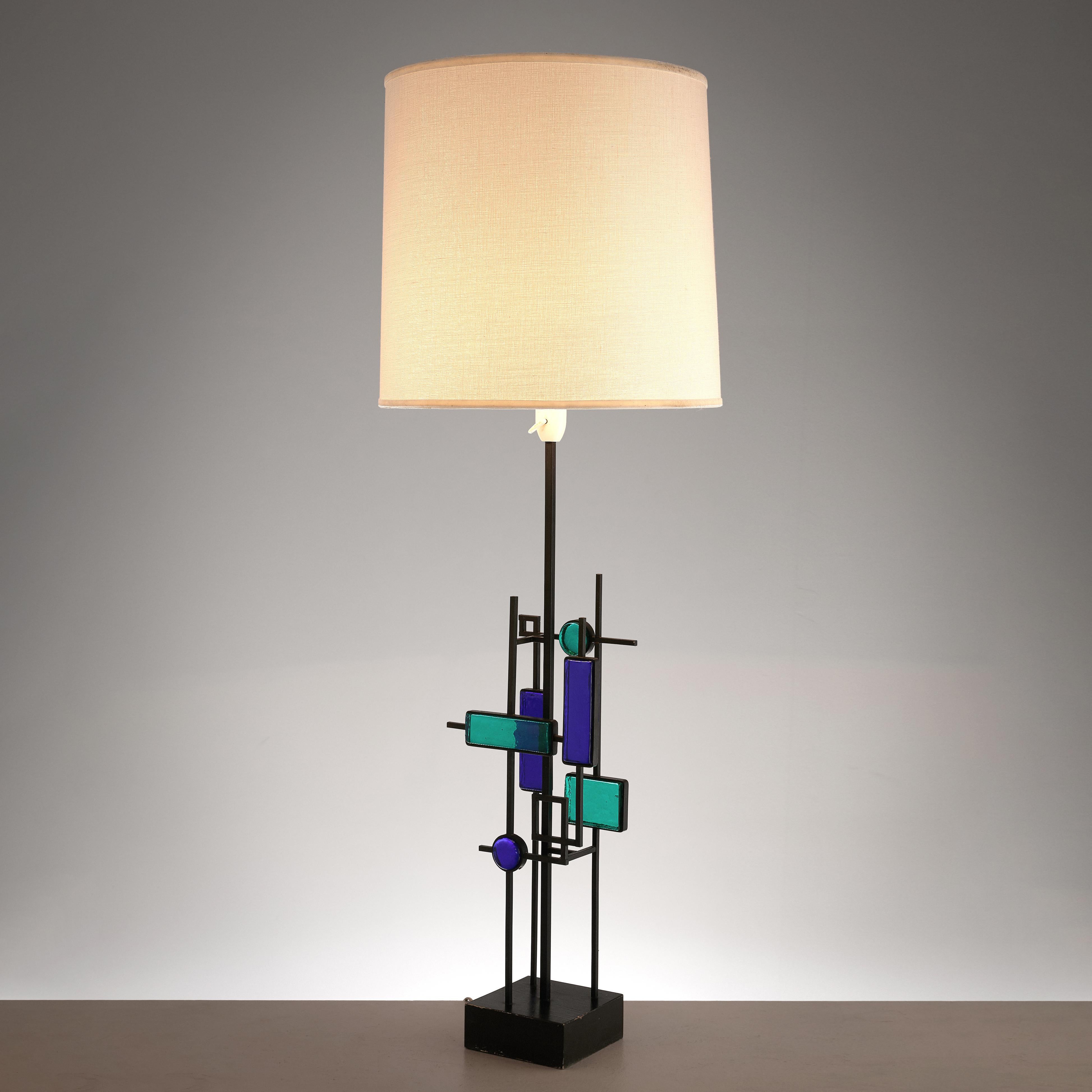 Svend Aage Holm Sørensen, table lamp, iron, wood and glass, Sweden, 1960s

This table lamp is an excellent example of finding itself at the intersection of art and design. The iron frame shows a beautiful construction of clear lines placed