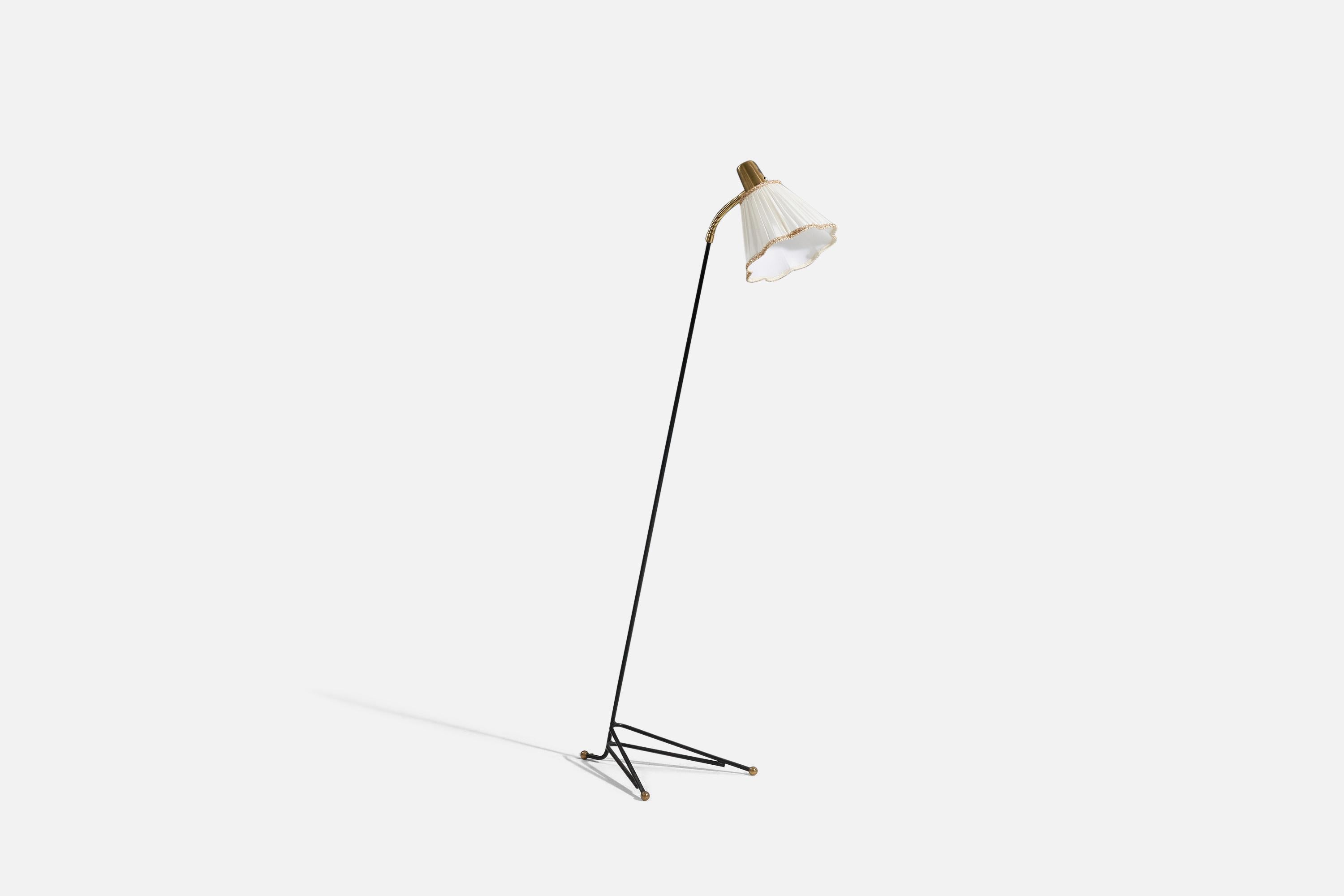 A brass, metal and brass floor lamp designed by Svend Aage Holm Sørensen and produced by ASEA, Sweden, 1950s.

Sold with Lampshade. 
Stated dimensions refer to the Floor Lamp with the Shade. 
Variable dimensions, measured as illustrated in the first